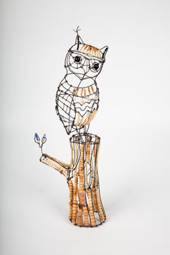 Lechuza posada en un tronco por Marie Christophe