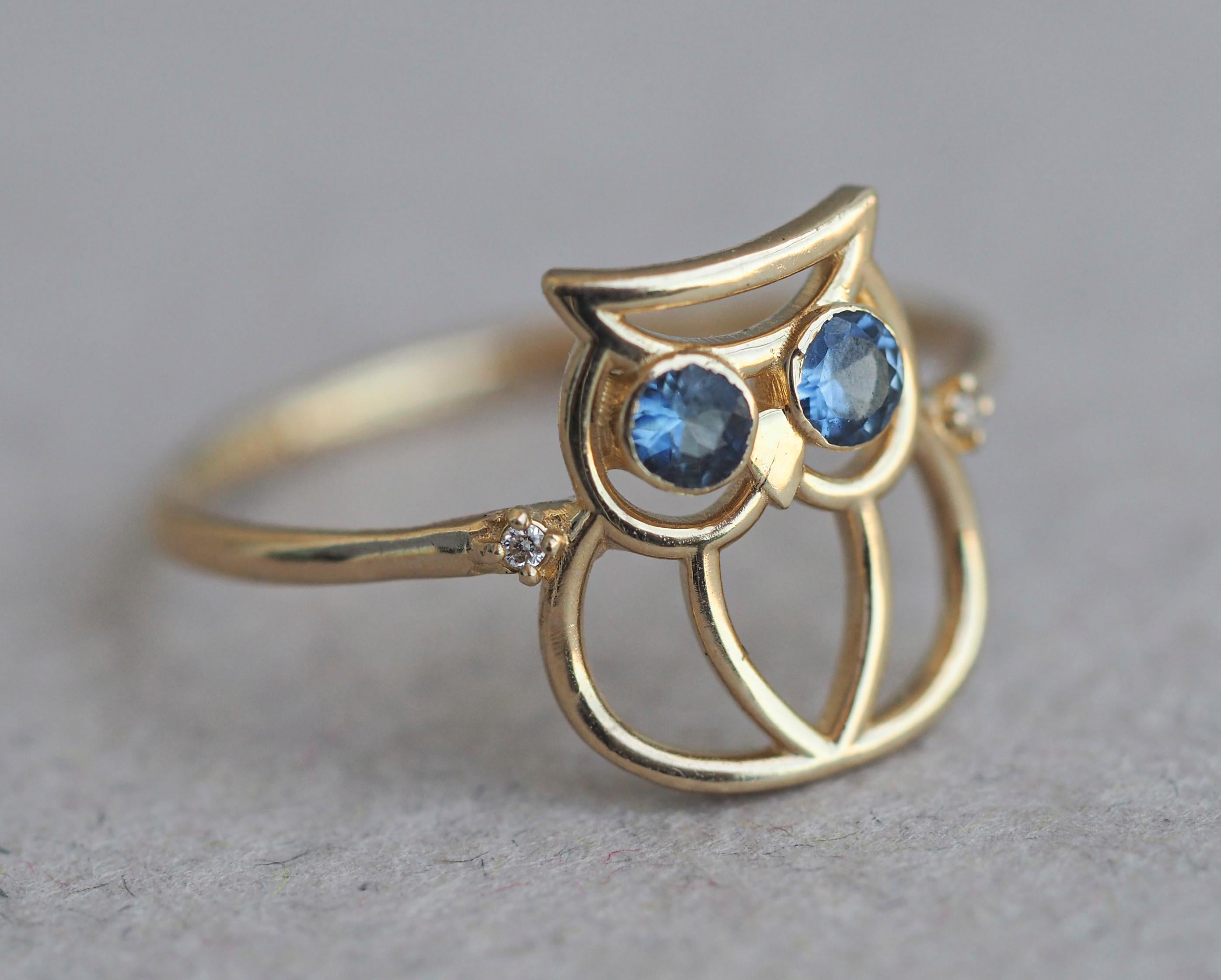 Owl Ring with tanzanites 14k gold. 
Tiny Owl ring. December Birthstone ring. Round Tanzanite Ring. Tanzanite Promise Ring. Gold Owl Ring.

Metal - 14k gold
Weight - 1.3 gr. depends from size.

Gemstones:
2 tanzanites, round cut, blue color,