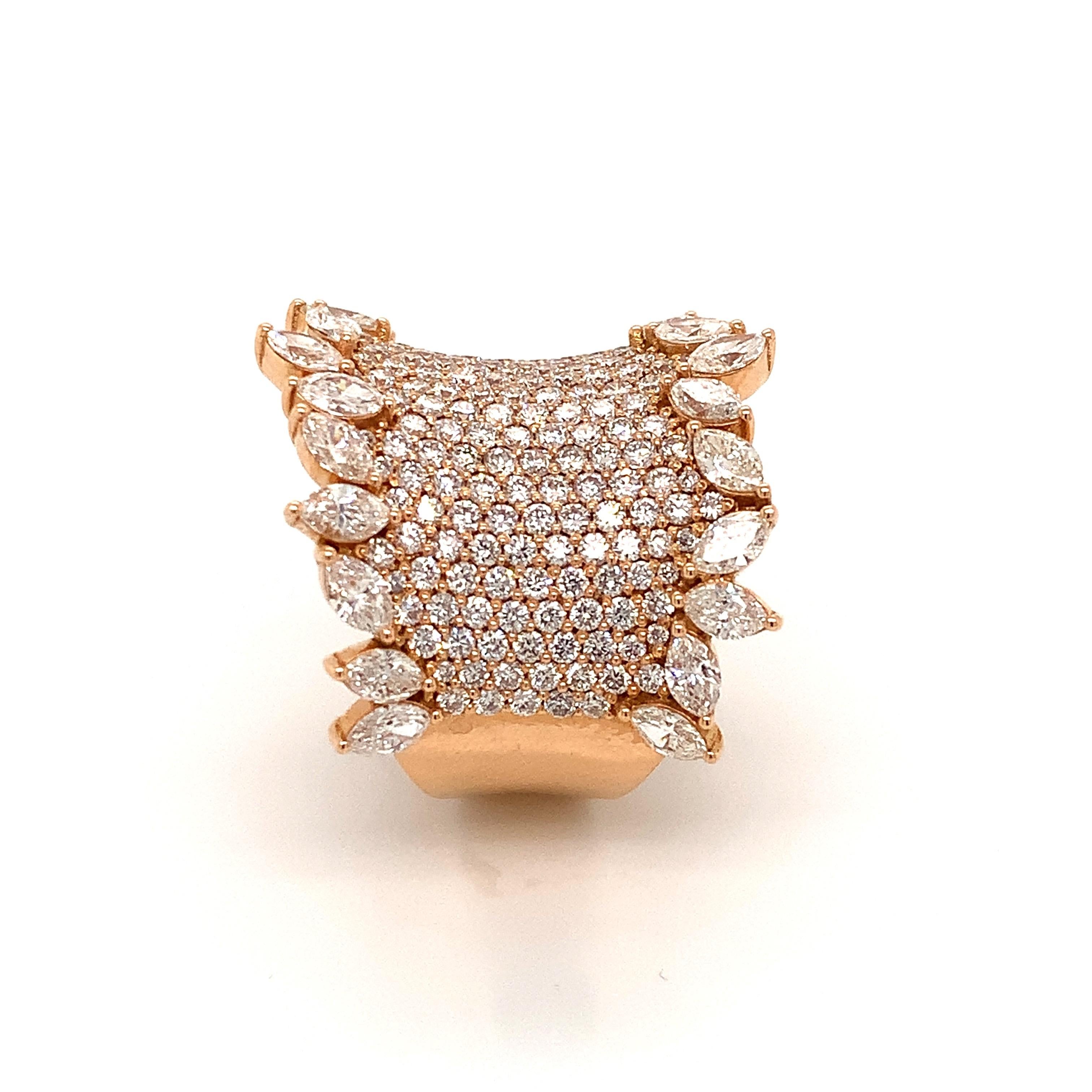 OWN Your Story 18K Rose Gold Brilliant and Marquise Diamond Edged Sheath Cocktail Ring. Fresh take on marquis for today's modern woman. 

OWN Your Story brings its 3 generations of family tradition and unparalleled experience with 18K gold,