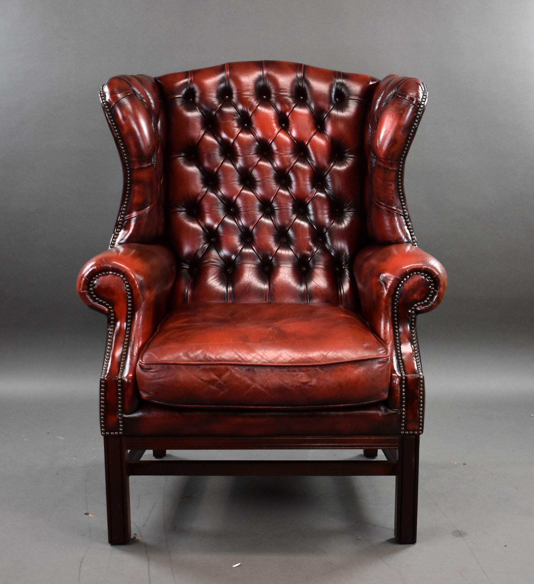 For sale is a good quality ox blood red leather wing back armchair, remaining in very good condition for its age.

Width: 98cm Depth: 90cm Height: 126cm