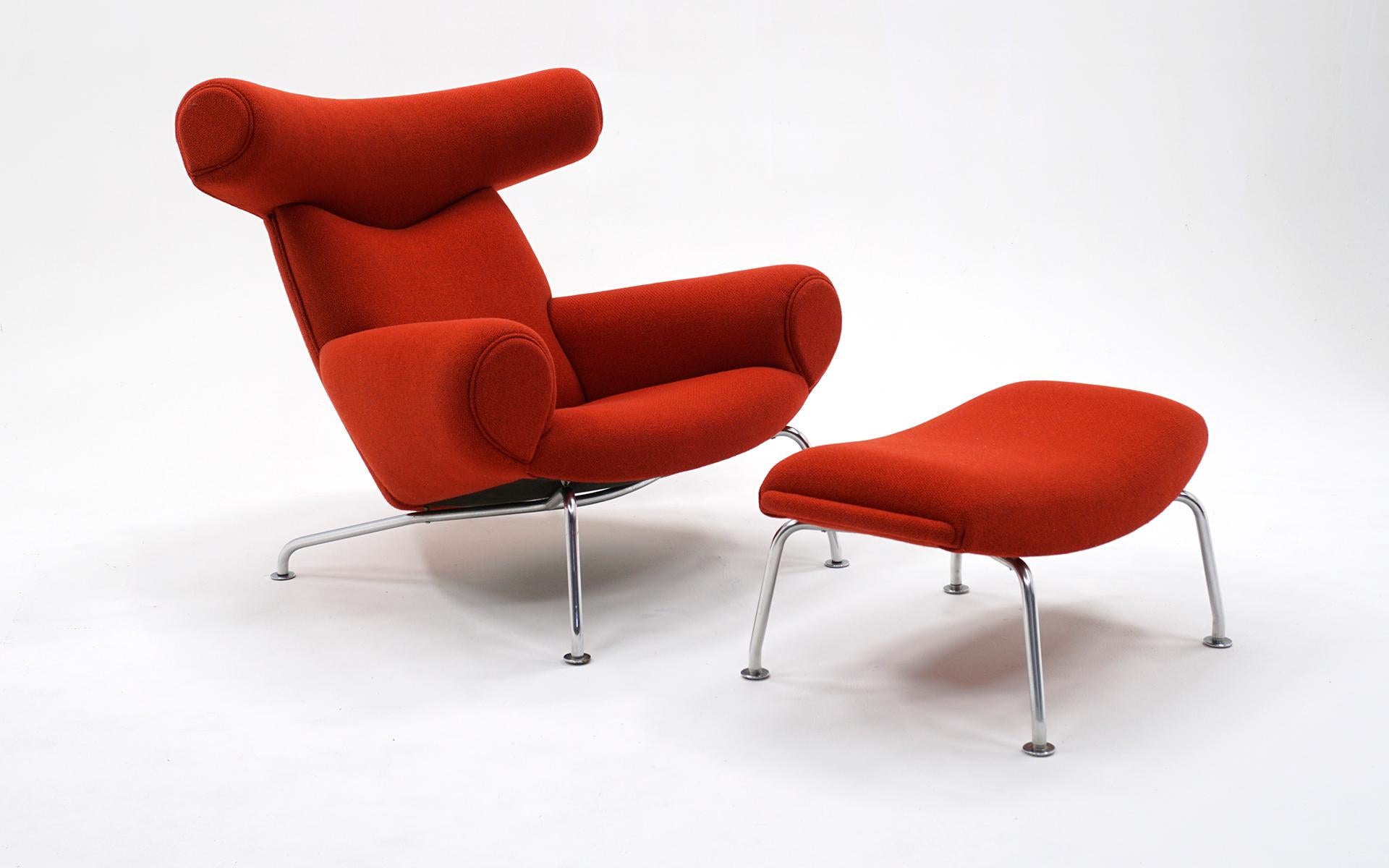Hans Wegner Ox Chair and Ottoman Model AP 46 expertly reupholstered in a red wood blend fabric.  This iconic mid century design is in great condition and ready to use.  Very comfortable, ready to ship and ready to use.