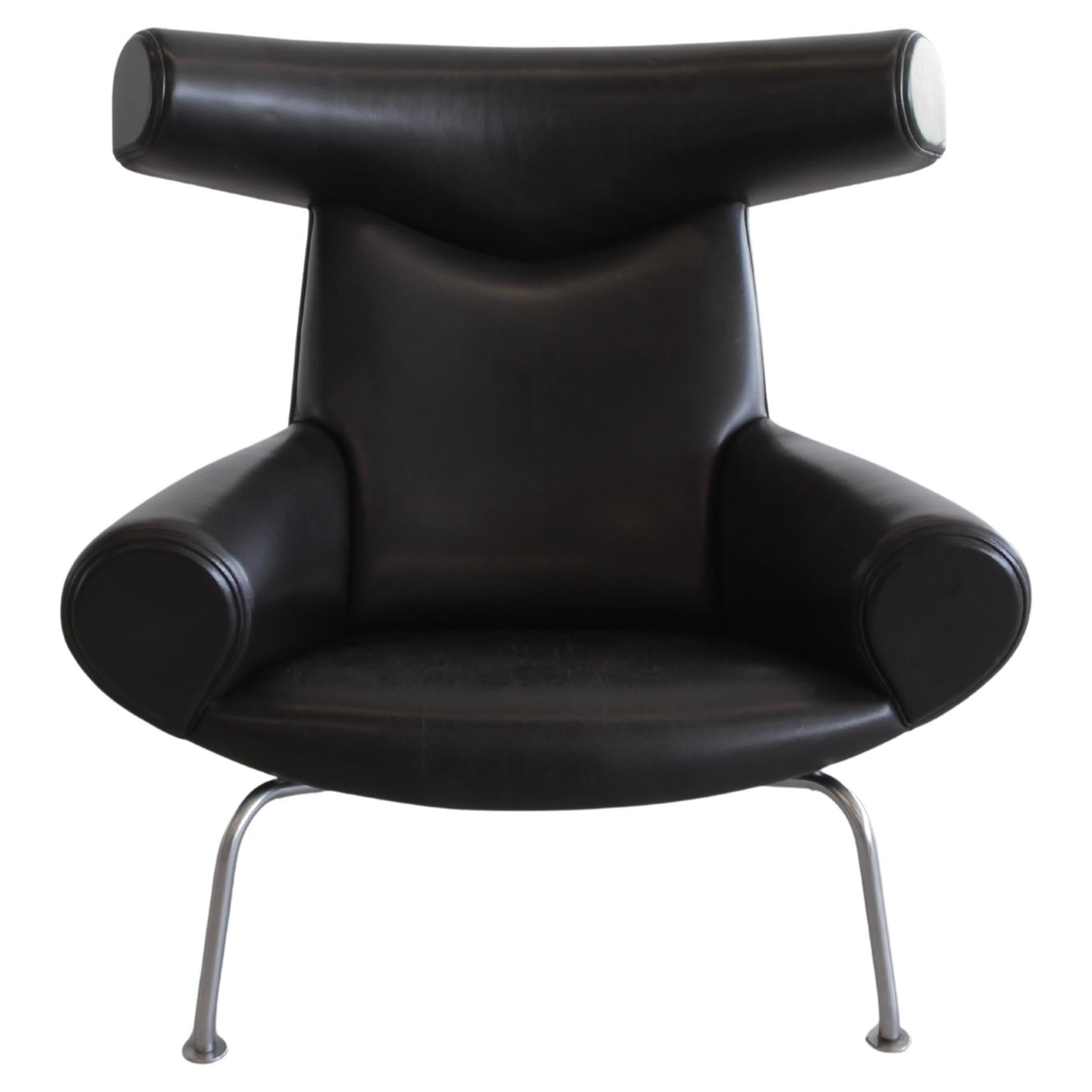 Lounge Chair designed by Hans J. Wegner. Denmark, AP Stolen, 1960's.

Vintage Ox-Chair AP 46 in black leather and tubular steel frame by Wegner. The Ox-Chair was produced by various makers over the last decades, this one is an early copy in used