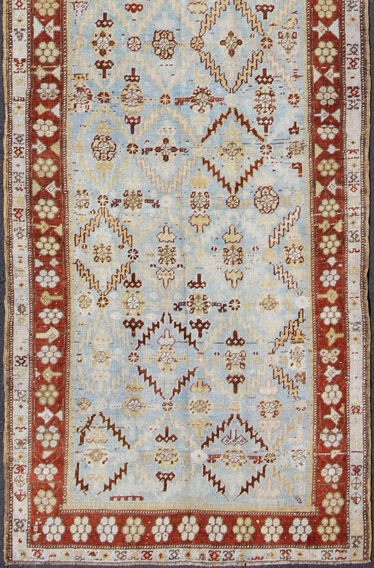 All-over design antique Persian Malayer runner with geometrics in blue and red, rug ema-7546, country of origin / type: Iran / Mahal, circa 1910.

This antique Persian Malayer runner, circa early 20th century, relies heavily on exquisite details as