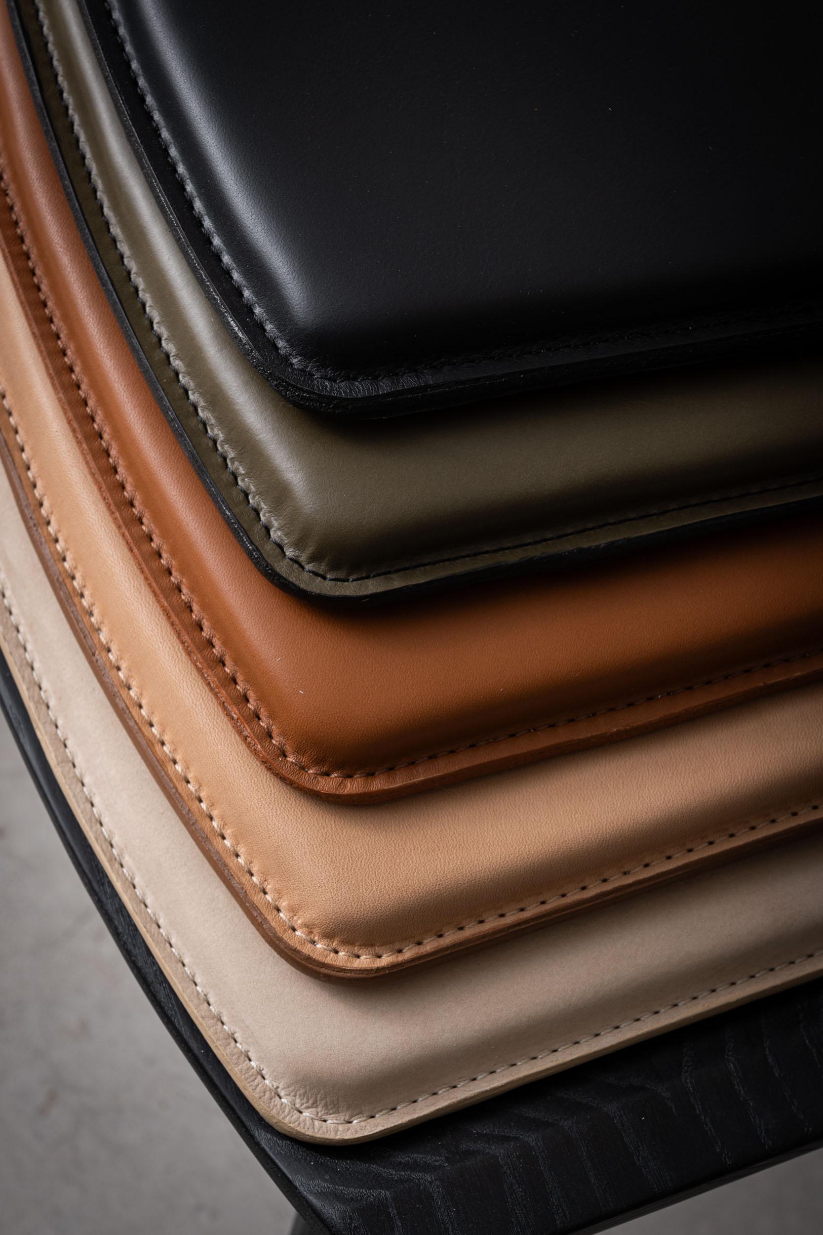 These leather seat pads fit the Oxbend Bench. They incorporate a non-slip pad in the bottom to keep them in place on the chair. Available in our three different high quality upholstery leathers: Matte Black, Olive, or Saddle Brown. And available in