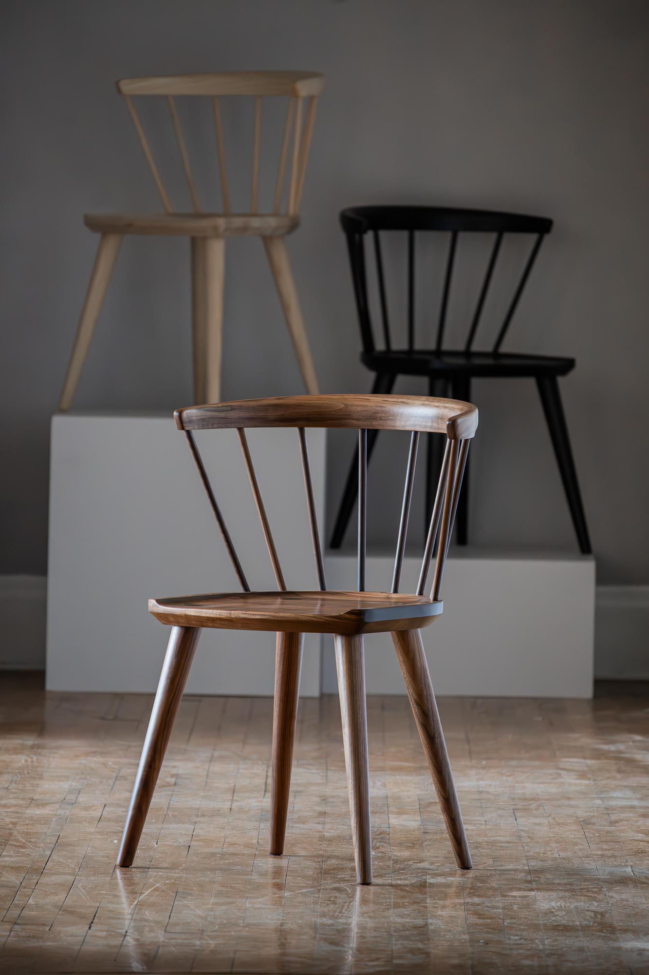 Our Oxbend Windsor chair, incorporates our first serious steam-bent pieces. It’s our first time working with green wood (as opposed to kiln dried), and watching green wood rebel against the intensity of steam bending, but eventually conform to its