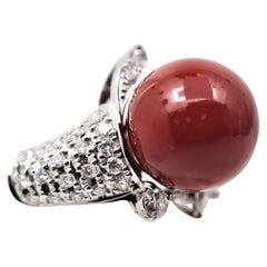 “Oxblood” Coral Diamond Platinum Ring
