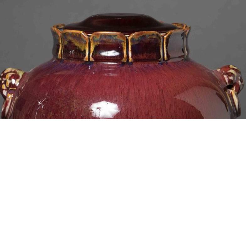 Material: Ceramic 
Origin: China
Age: Republic period, circa 1915
Size: 10.5 inches in height 

We have a nice collection of oxblood vases currently. As well as black Chinese vases.

As designers we plant these vases with orchids or silk