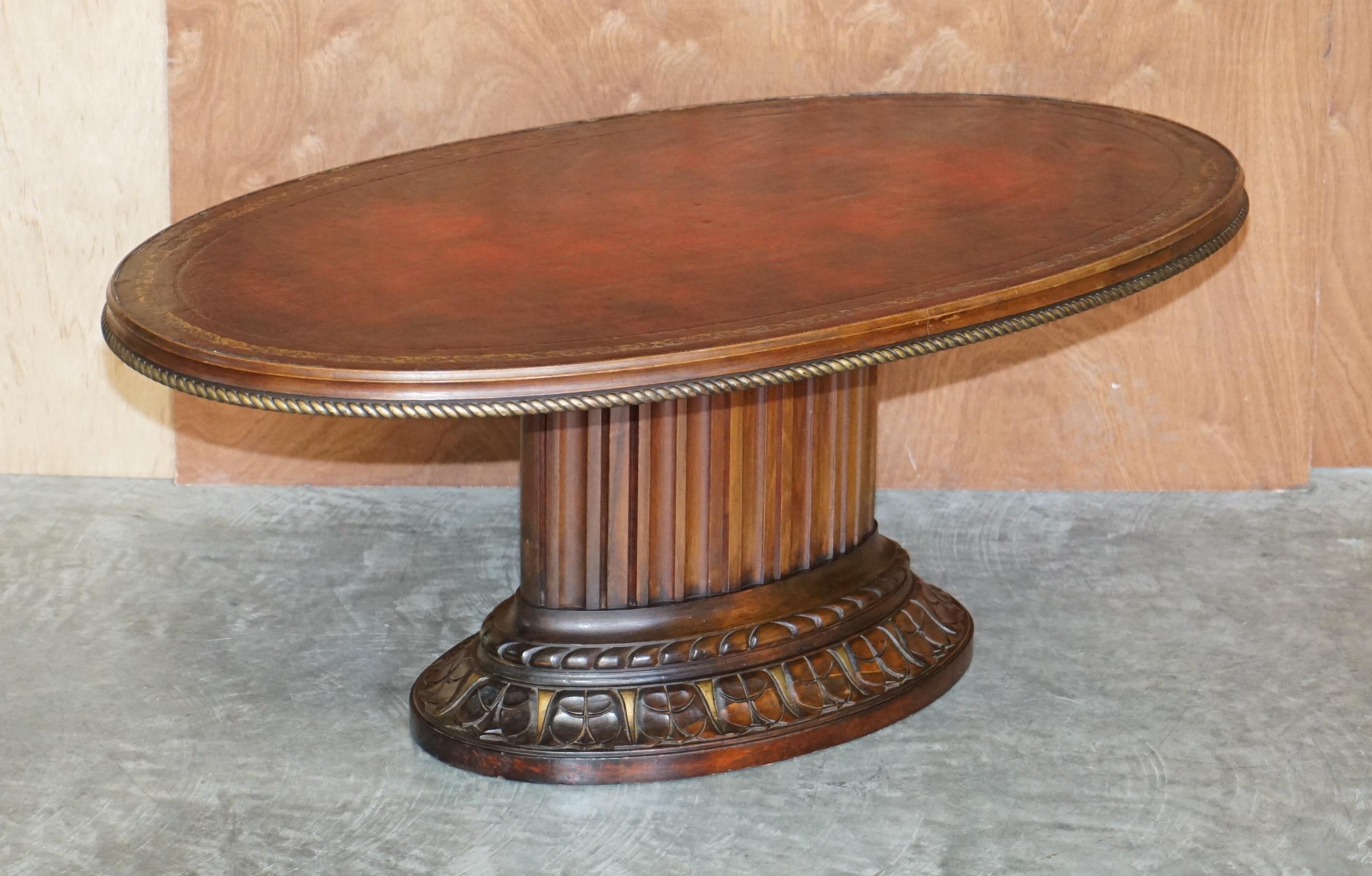 We are delighted to offer for sale this lovely vintage hand made Oxblood leather oval coffee or cocktail table with Roman Corinthian pillar type base

A good looking and decorative table, I’ve never seen this model before, its very decorative. The