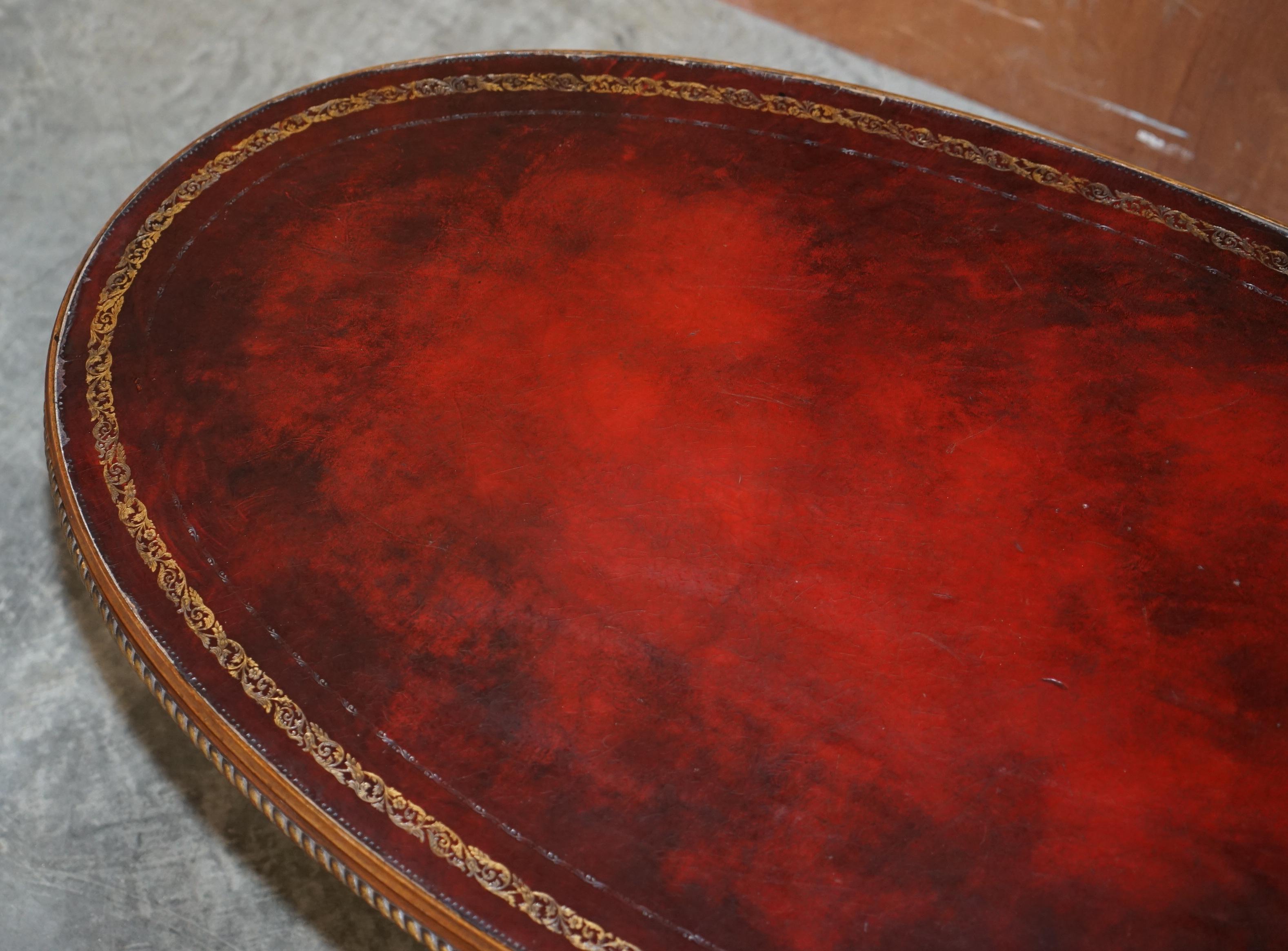 Hand-Crafted Oxblood Leather Oval Roman Pedestal Base Coffee or Cocktail Table Nice Find