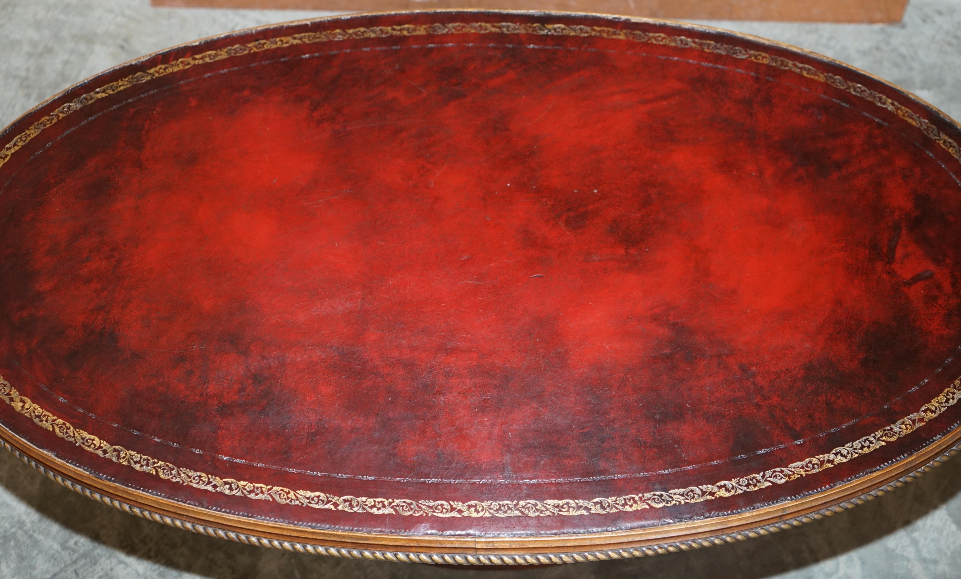 20th Century Oxblood Leather Oval Roman Pedestal Base Coffee or Cocktail Table Nice Find