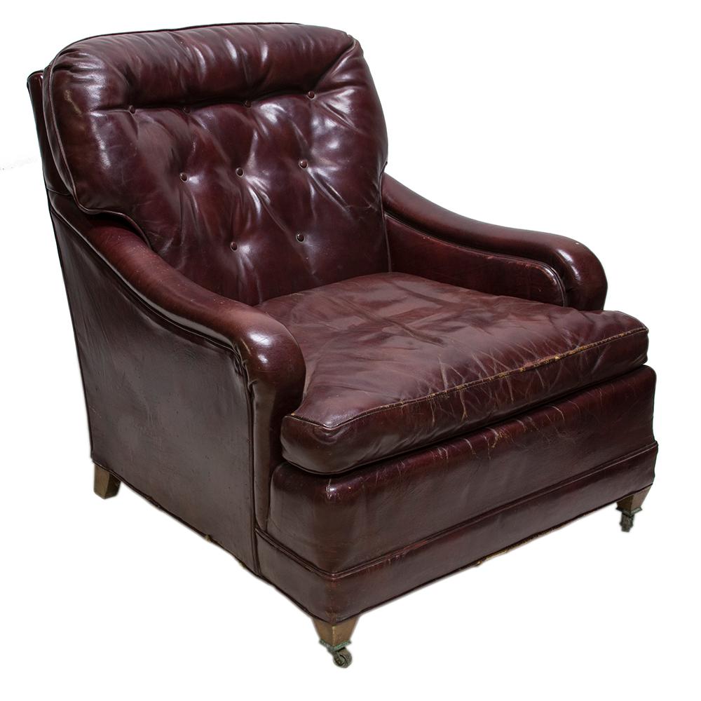 This vintage leather club chair has character and style. The Chesterfield style tufted back cushion is a nice accent to the gently sloping arms and Classic boxy form.