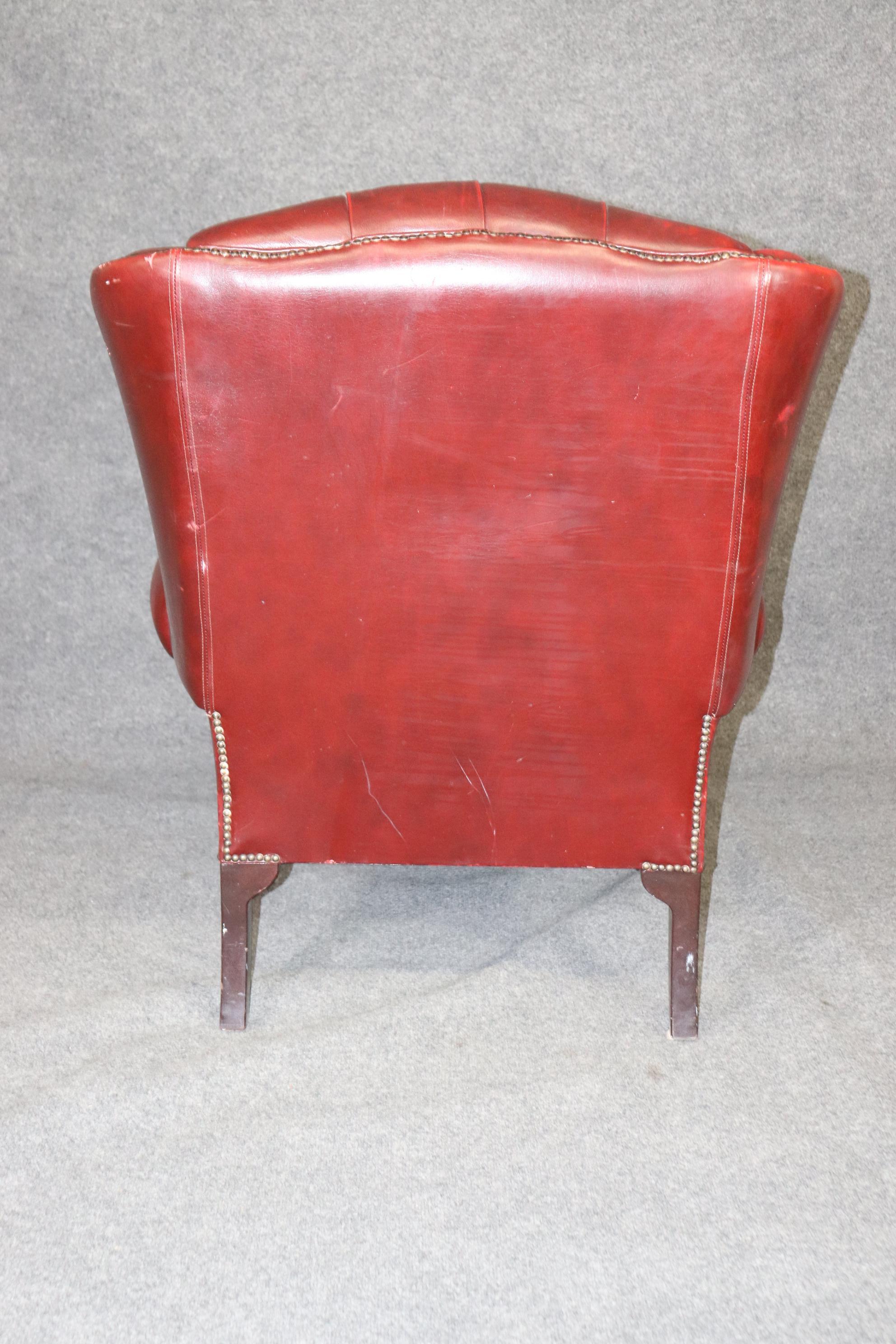 English Oxblood Tufted Leather Chesterfield Style Wing Chair Queen Anne, circa 1960