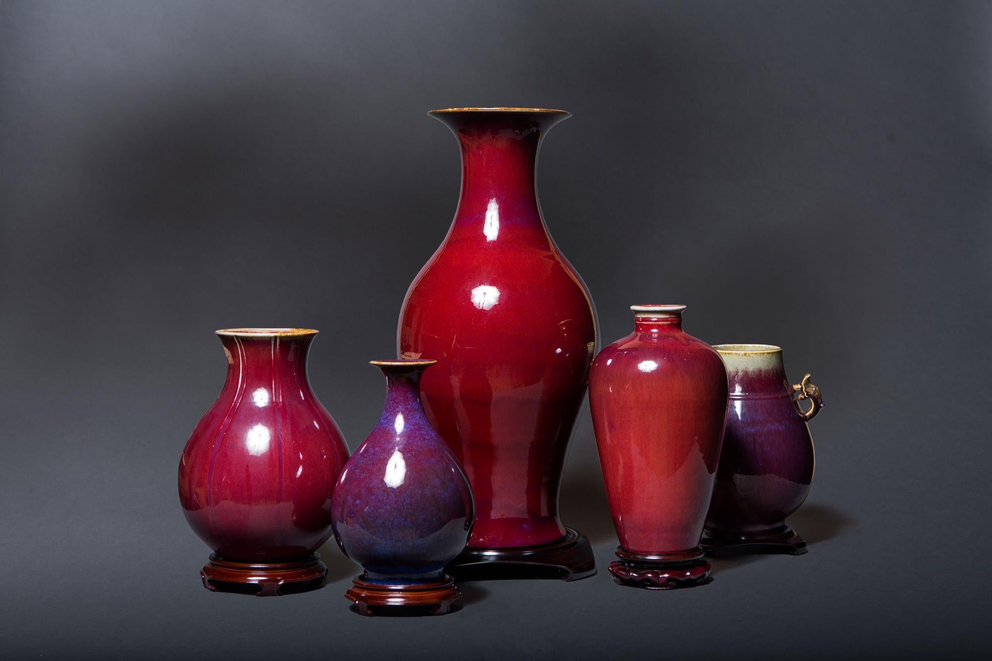 Material: Ceramic 
Origin: China
Age: Ching dynasty, Chia Ching period, circa 1800
Size: 14 inches in height 

We have a nice collection of oxblood vases currently. As well as black Chinese vases.

As designers we plant these vases with
