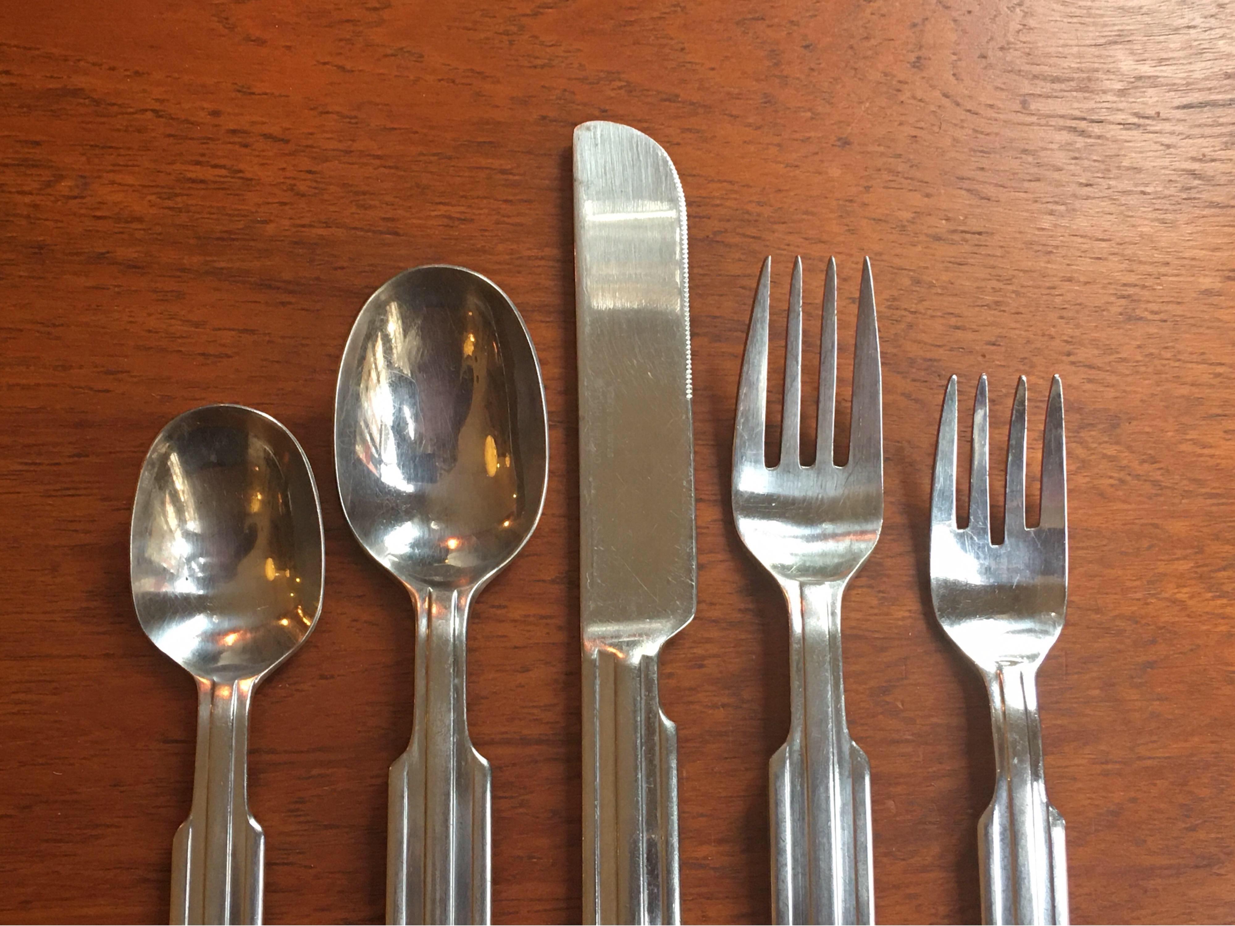 Oxford hall service for 8, plus 12 teaspoons total!  Probably a design from the 1970s great weight and quality to the stainless! both 
Each set:
8 dinner knives
8 dinner forks
8 salad forks
8 tablespoons
12 teaspoons.