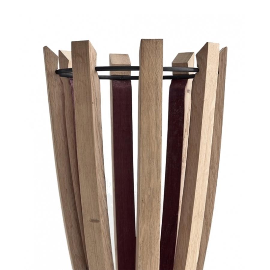 Umbrella Stand Oxford in solid hand-crafted oak
whose shape is characterized by the outline and 
burgundy color of the staves from barrels. The 
upper rim and the base, both made of iron, ensure 
support and solidity for this original and subtle