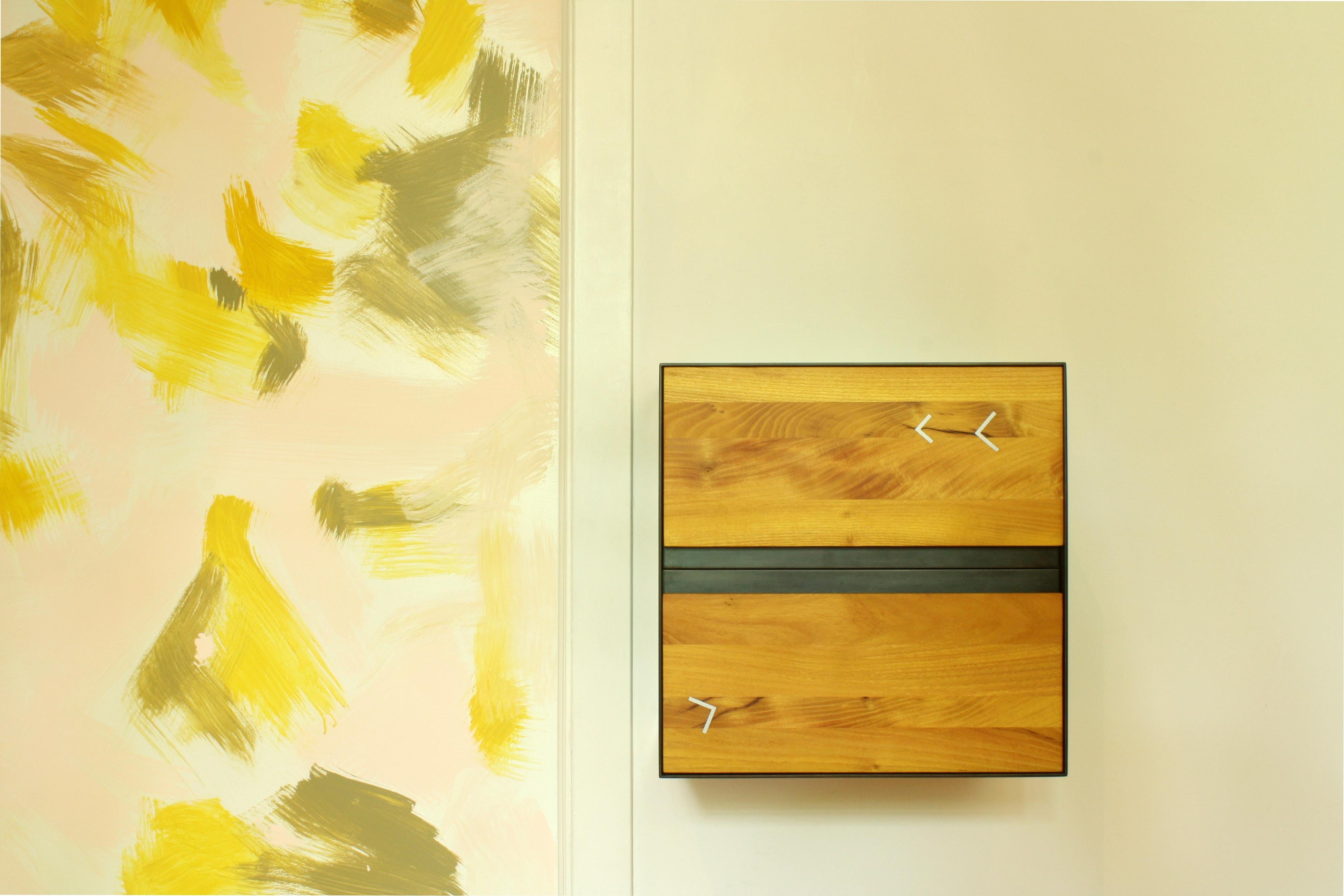 Shown in: osage orange with inlaid aluminum points and blackened steel

Listing price represents wall-mounted or 