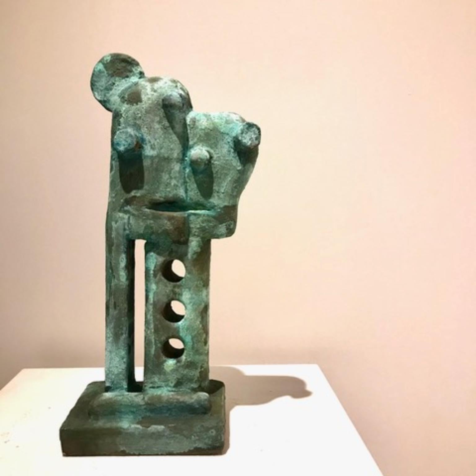 Oxidized Bronze Green Blue Metallized Mini Totem by Frederic Texier
Dimensions: W 14 x D 10 x H 37 cm. 
Materials: Concrete coated with bronze powder and then oxidized. 
Color: Oxidized bronze (green blue)

Artist Frédéric Texier expresses a passion