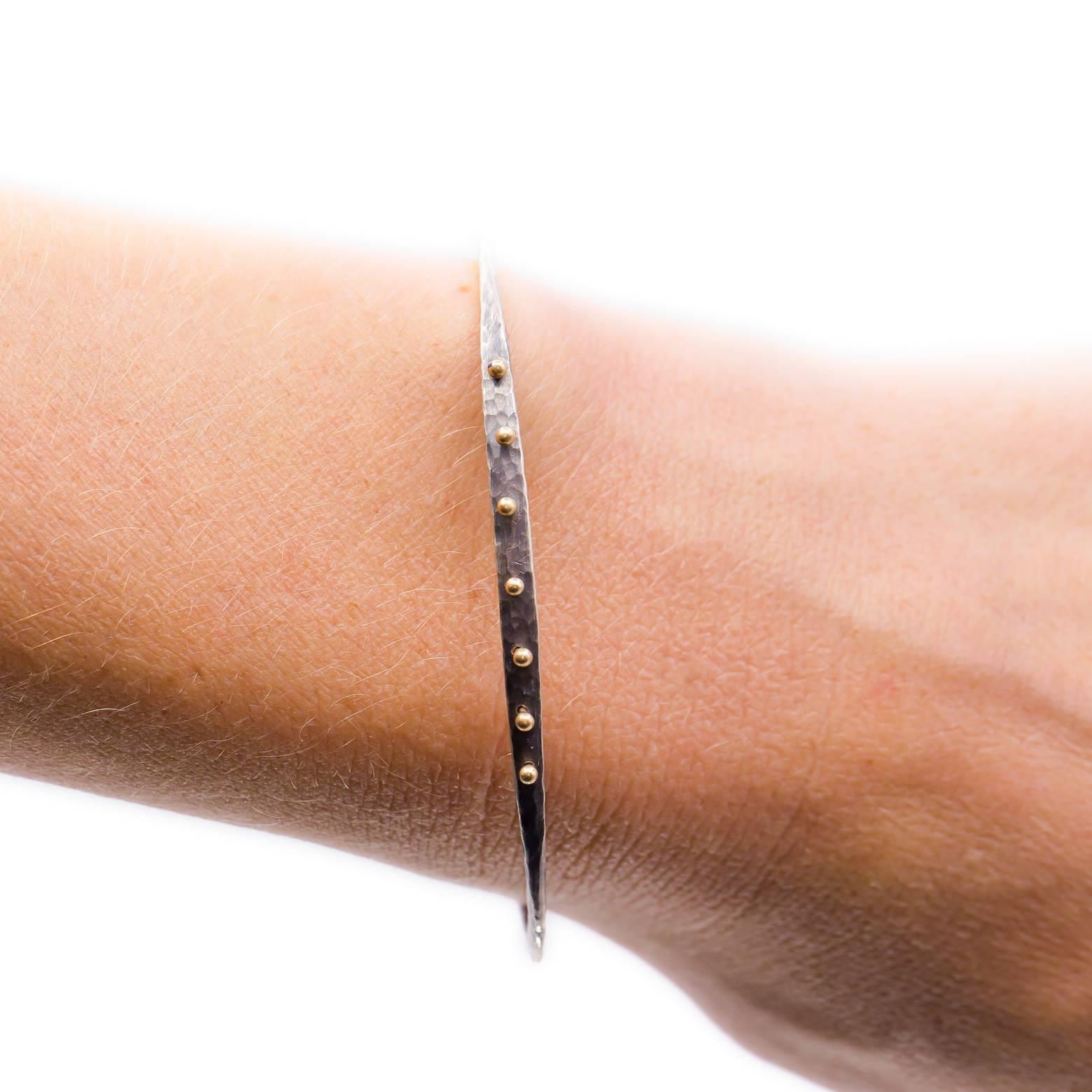Modern Oxidized Hammered Sterling Silver Bangle with 14 Karat Yellow Gold Studs For Sale