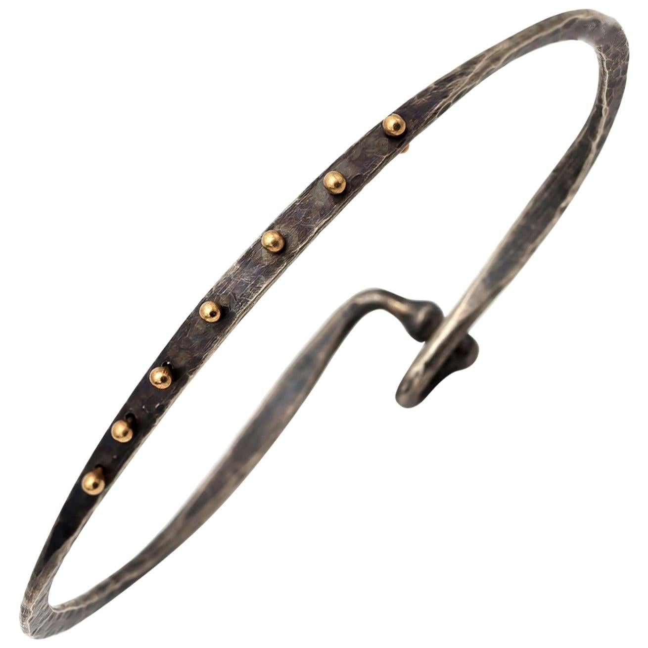 Oxidized Hammered Sterling Silver Bangle with 14 Karat Yellow Gold Studs For Sale
