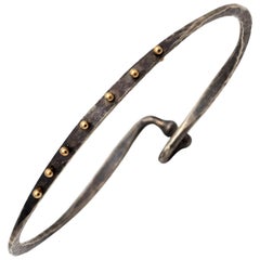 Oxidized Hammered Sterling Silver Bangle with 14 Karat Yellow Gold Studs