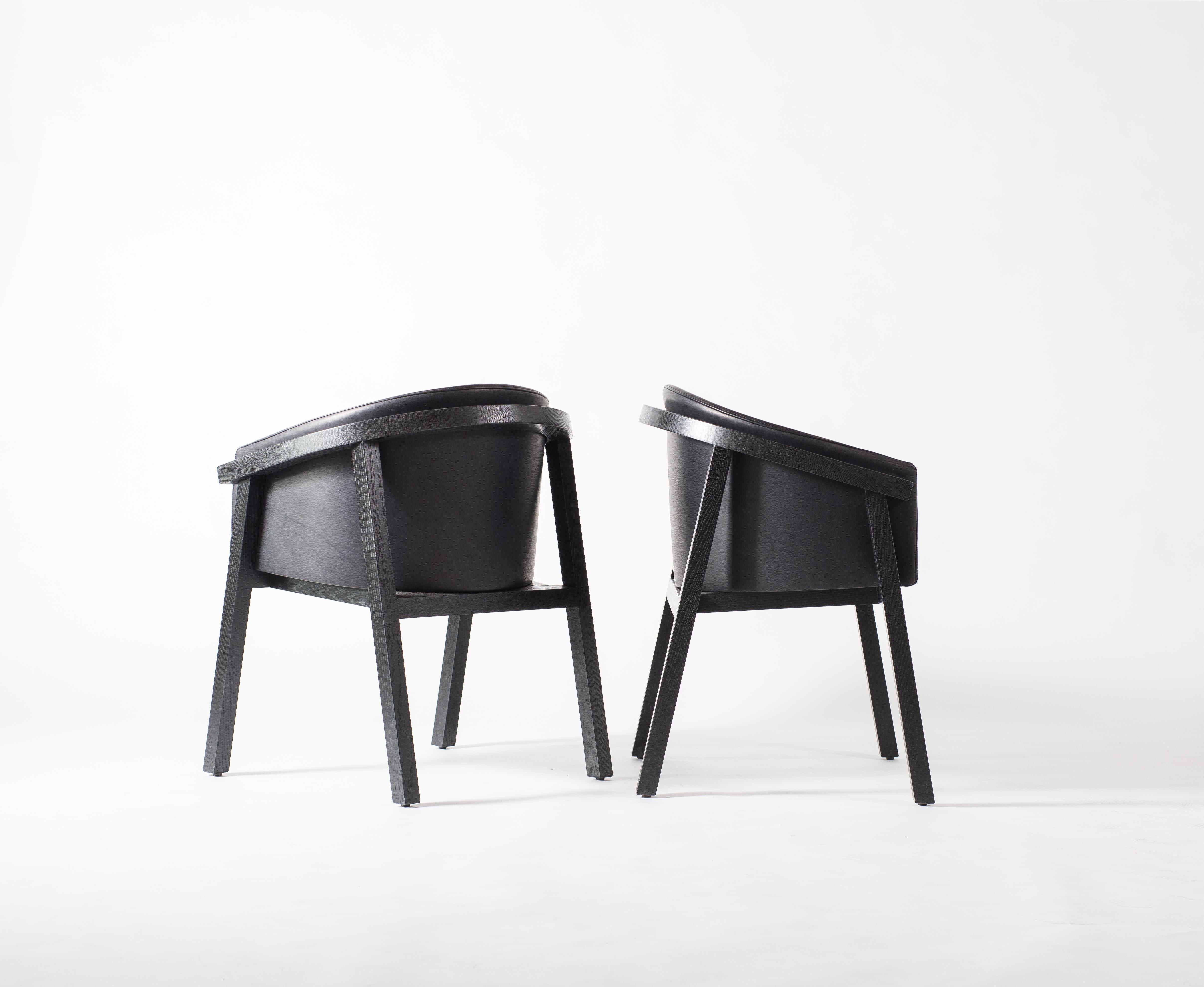 black bucket dining chairs