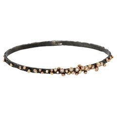 Oxidized Silver, 18K YG Dark Gleam Bangle with Diamonds by Agneta Bugyte