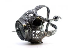 Oxidized silver Marian crown with cutouts and raised floral motifs, cross top