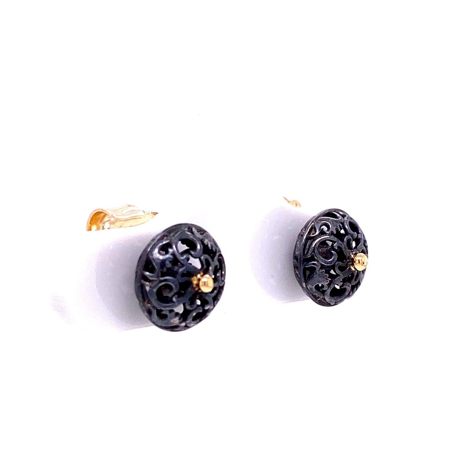Contemporary Oxidized Sterling Silver and 18k Yellow Gold Scroll Studs with Meteorite Jackets For Sale