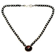 Oxidized Sterling Silver Bead Necklace with Carnelian Pendant and Applied Accent