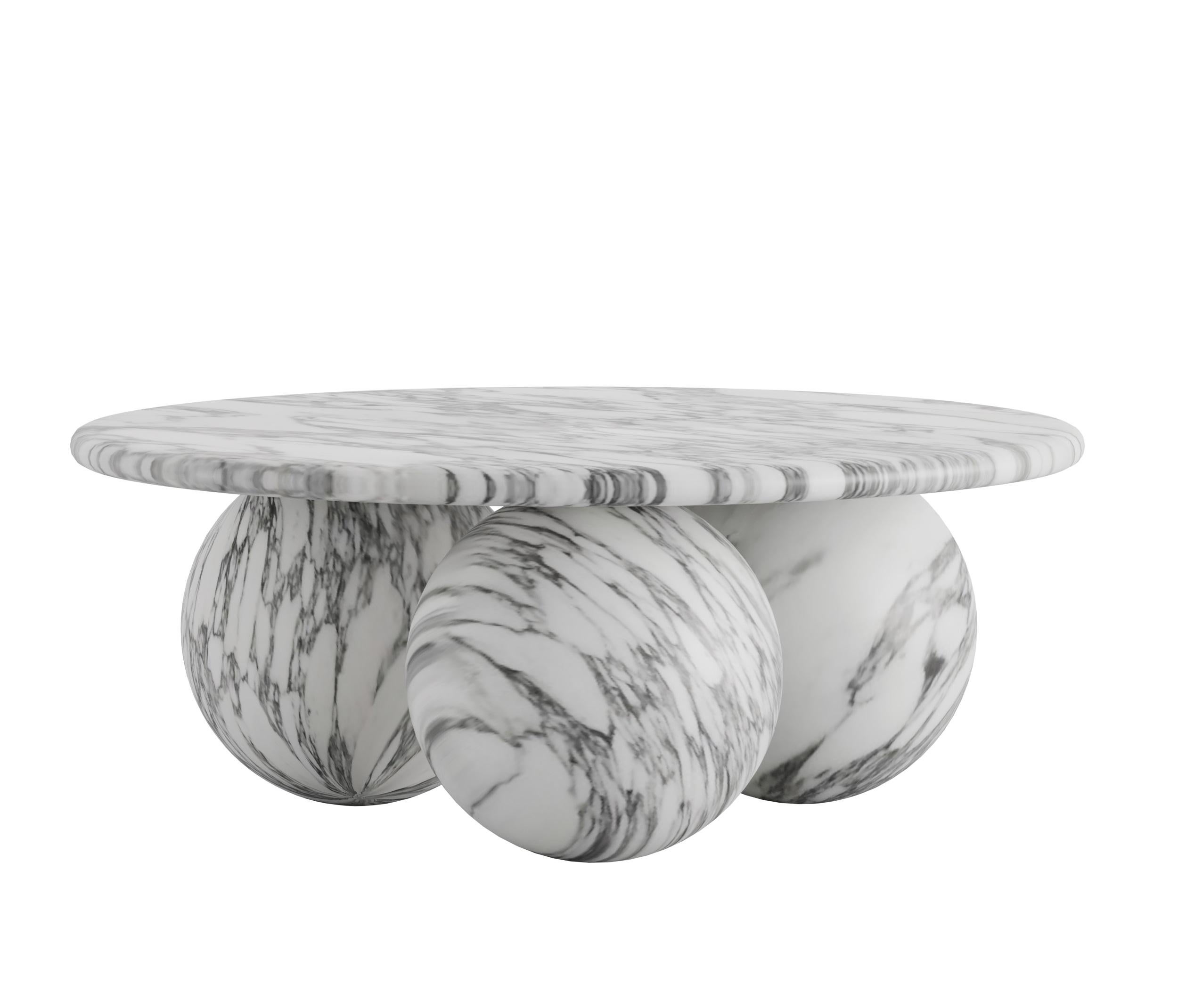 Oxley Center Table is a masterpiece in its own right, showcasing the inherent allure of natural Italian marble. The table's surface boasts a symphony of delicate veining, an exquisite result of nature's unique handiwork. With no two pieces alike,