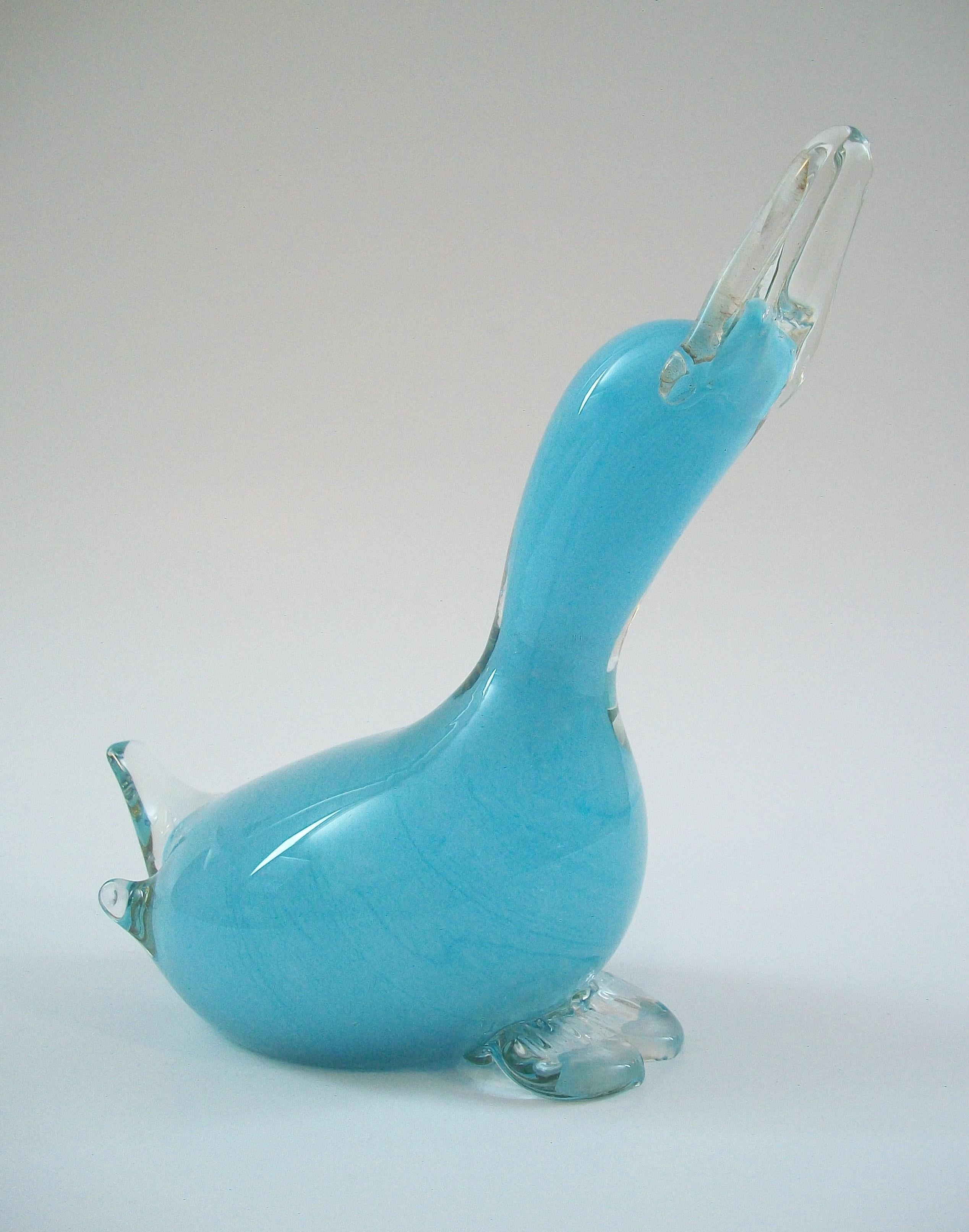 OY KUMELA (Manufacturer) - ARMANDO JACOBINO (Designer) - Mid Century studio glass duck figure - featuring cased and applied clear glass beak, tale and feet - striking turquoise blue color to the interior - signed on the base - Finland - circa