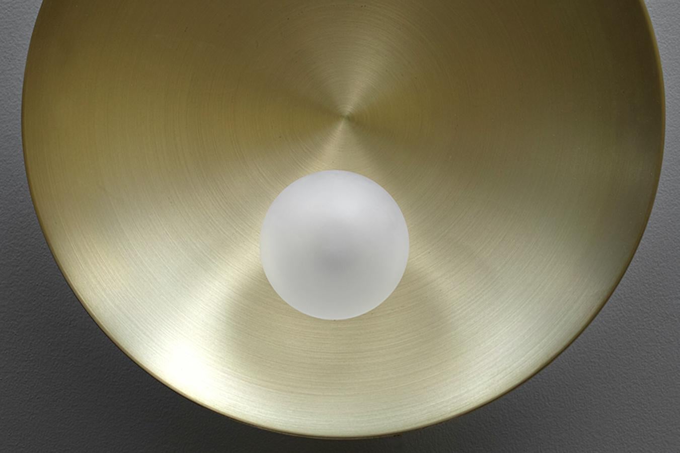 Oyster brass sconce, Carla Baz
Dimensions: 110 x 40 x 18 cm
Materials: Brushed brass 

Oyster is a series of sculptural lighting pieces where the delicately nested pearl in its protective shell embodies itself a poetic and meaningful metaphor.