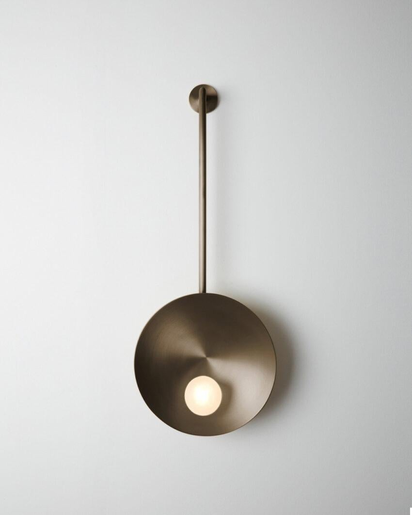 Oyster Brushed Bronze Wall Mounted Lamp With Rod by Carla Baz
Dimensions: D 9 x W 30 x H 78 cm.
Materials: Brushed bronze.
Weight: 2 kg.

Available in verdigris, brushed brass, stainless steel, copper or bronze finishes. Available in different color
