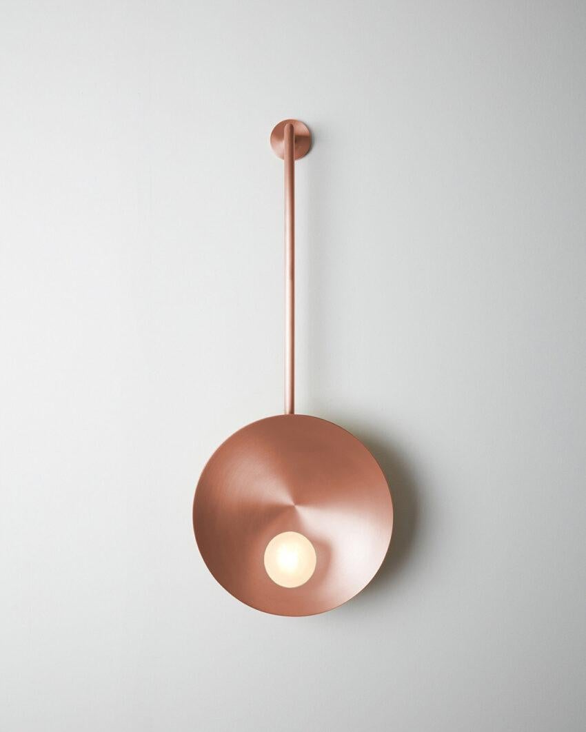 Oyster Brushed Copper Wall Mounted Lamp With Rod by Carla Baz
Dimensions: D 9 x W 30 x H 78 cm.
Materials: Brushed copper.
Weight: 2 kg.

Available in verdigris, brushed brass, stainless steel, copper or bronze finishes. Available in different color