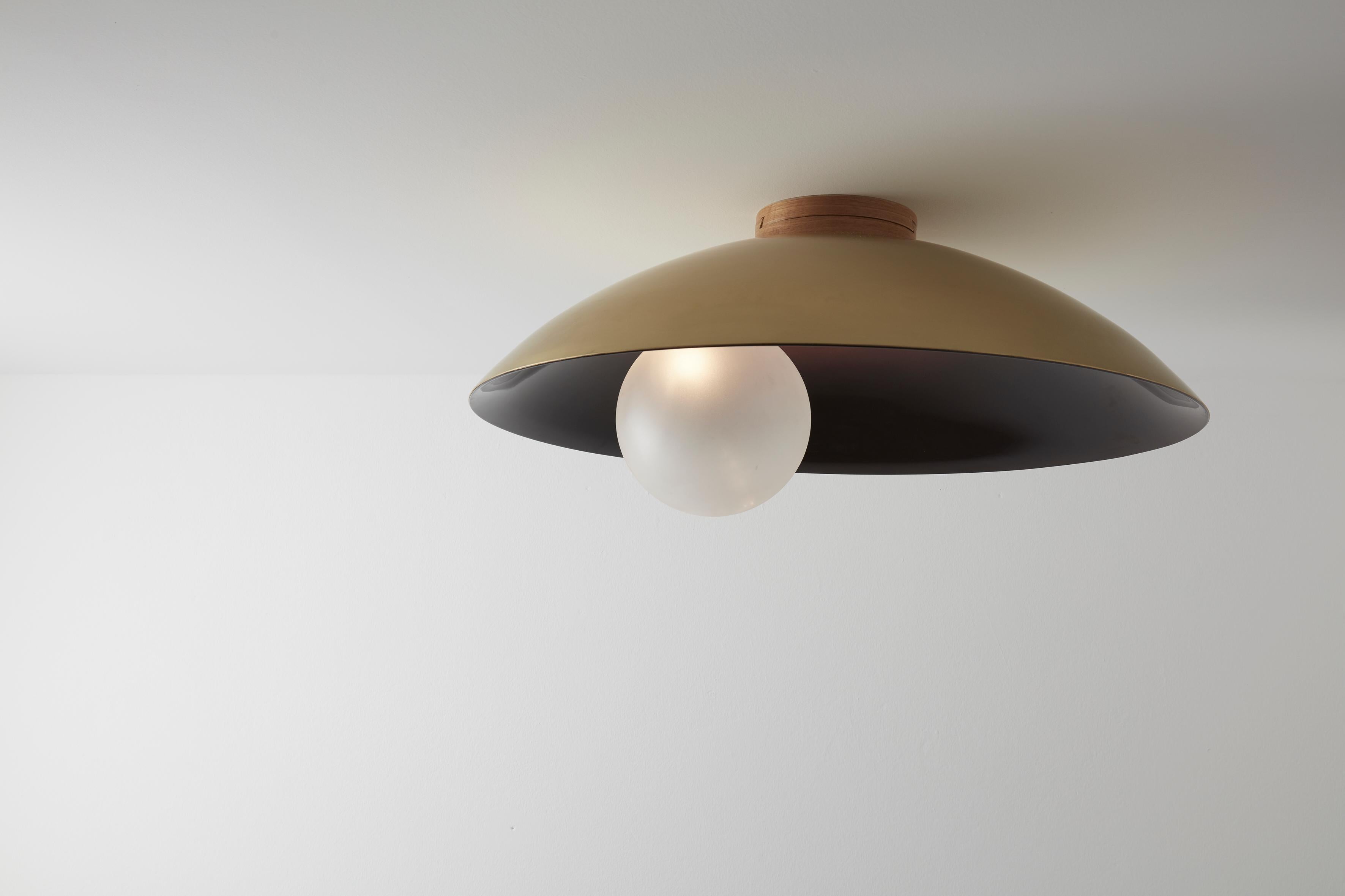 Oyster ceiling mounted Burgundy, Carla Baz
Dimensions: ø 70 x D 32 cm
Weight: 9 kg
Material: Brass, blown satin glass globes

Oyster is a series of sculptural lighting pieces that were developed in 2016. Wanting to explore the idea of customization