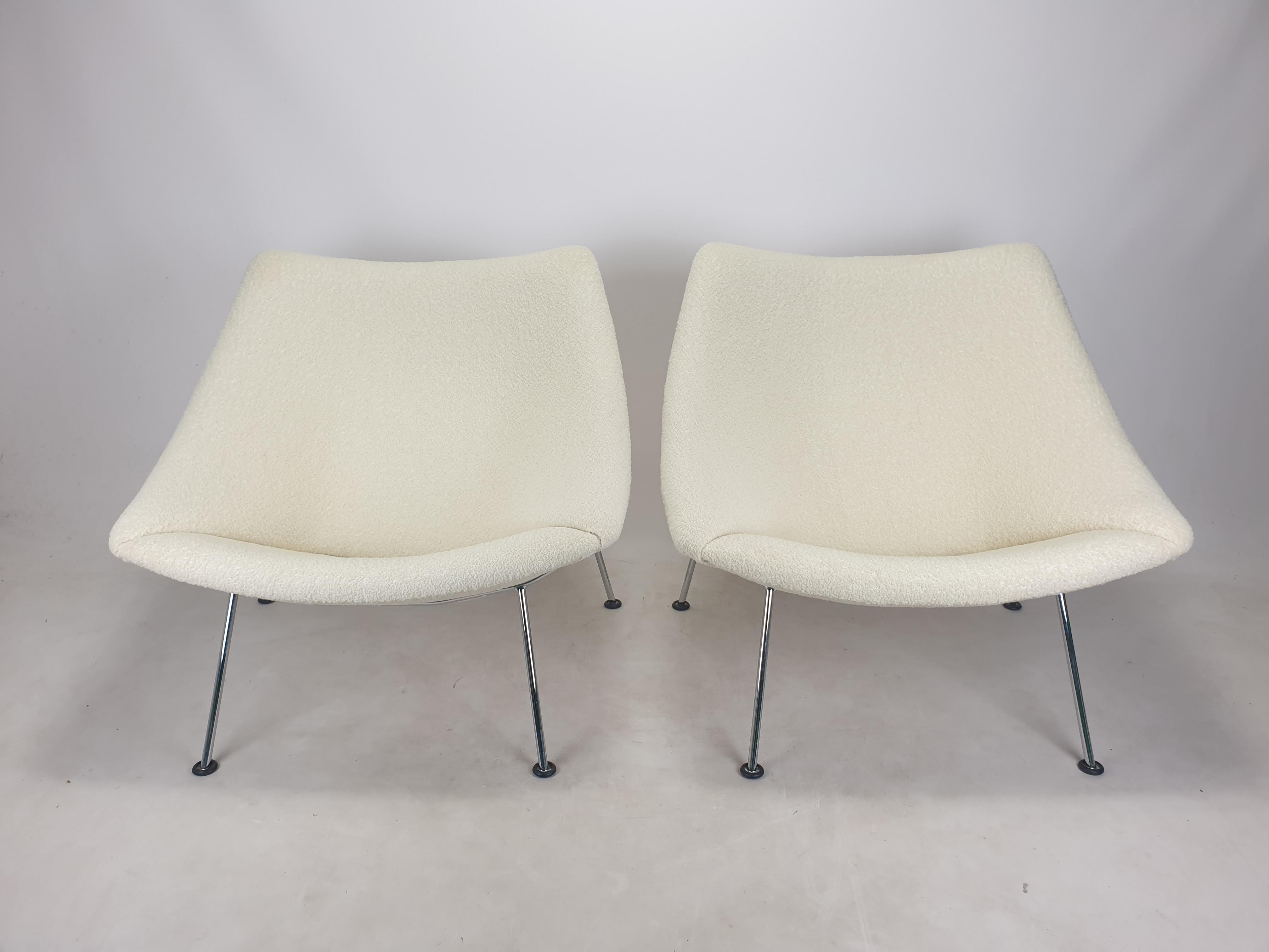 A set of the famous and very comfortable Artifort Oyster Chairs by Pierre Paulin. 

Designed in the beginning of the 60's, this particular set is manufactured in the 80's. 
They have chromed metal legs.

This lovely set is just restored with