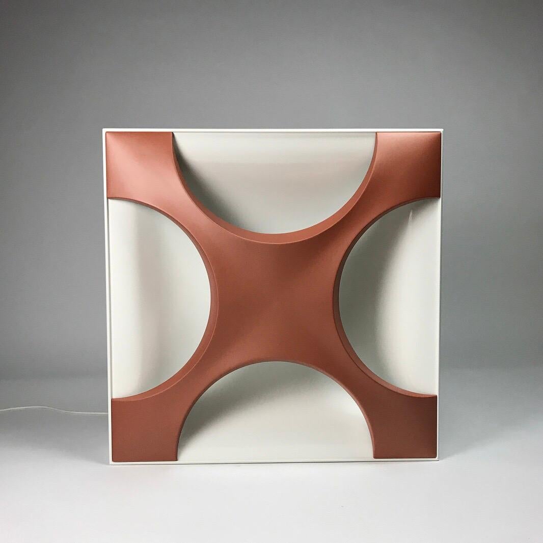 Beautifully designed flush mounted light panel for either wall or ceiling by Rolf Krüger for Staff Leuchten, Germany, 1968.

Sculptural light panel oyster in copper and white lacquer. With the giant size of 24.4” • 24.4” pictures only deceive