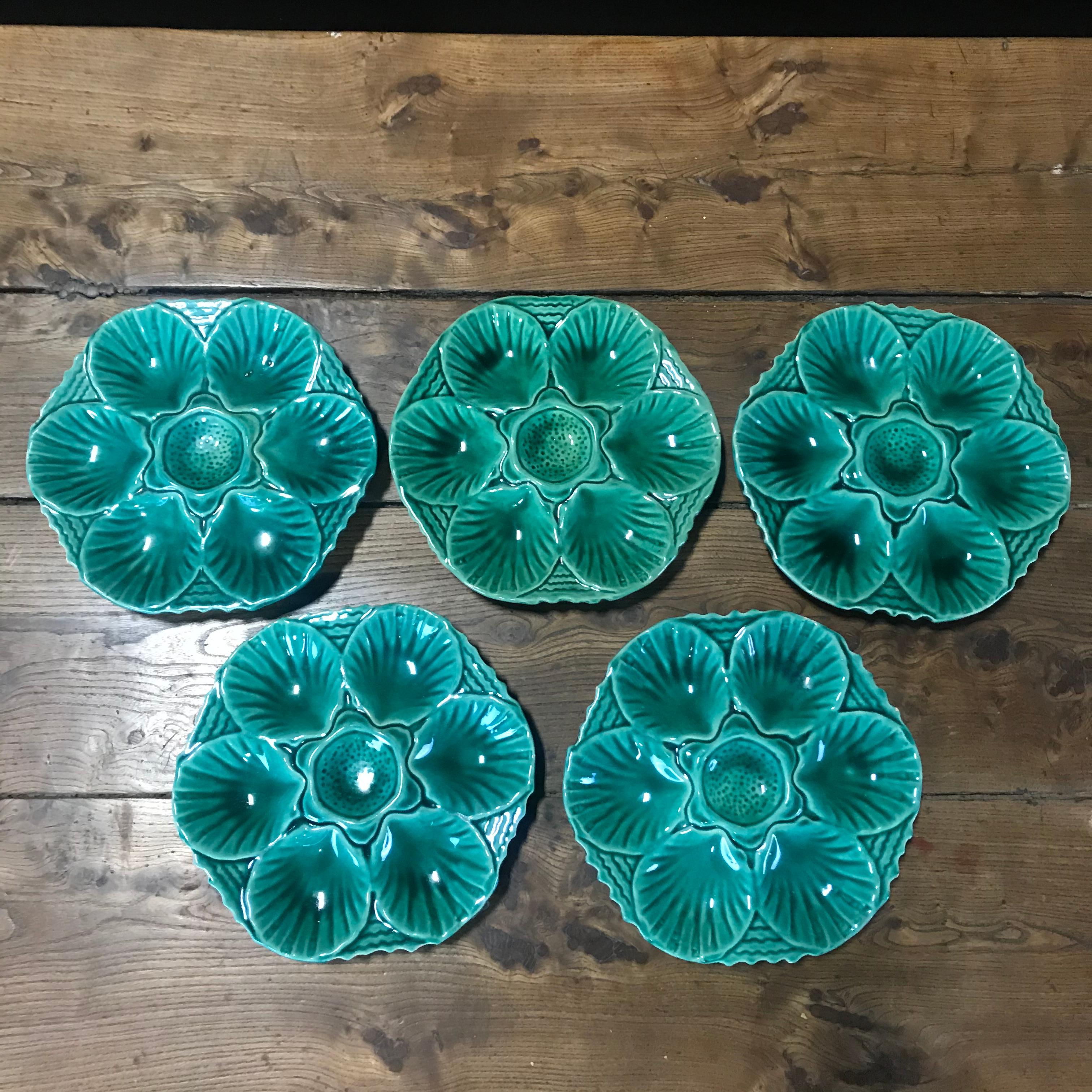 Wonderfully detailed set of 10 ceramic French oyster plates in a yummy shade of green.
  