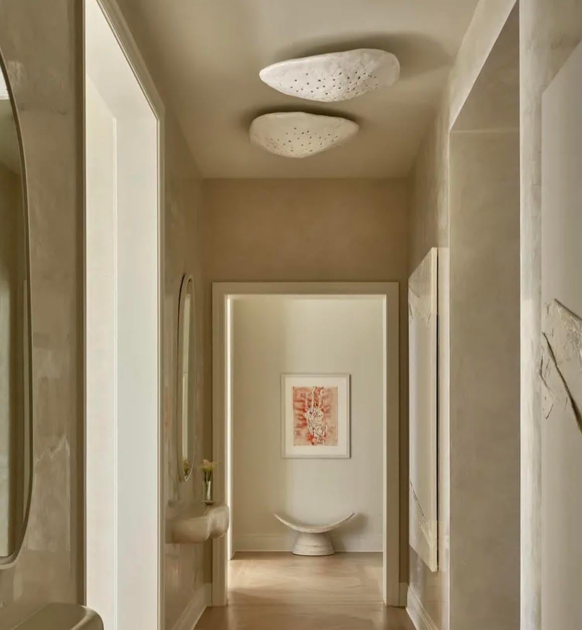 Inspired by oyster and scallop shells, the Oyster Pendant explores the juxtaposition between raw material and beauty. These pieces are composed of fiberglass, gypsum, paper pulp, and steel and come in perforated or smooth shells.

Every size can be