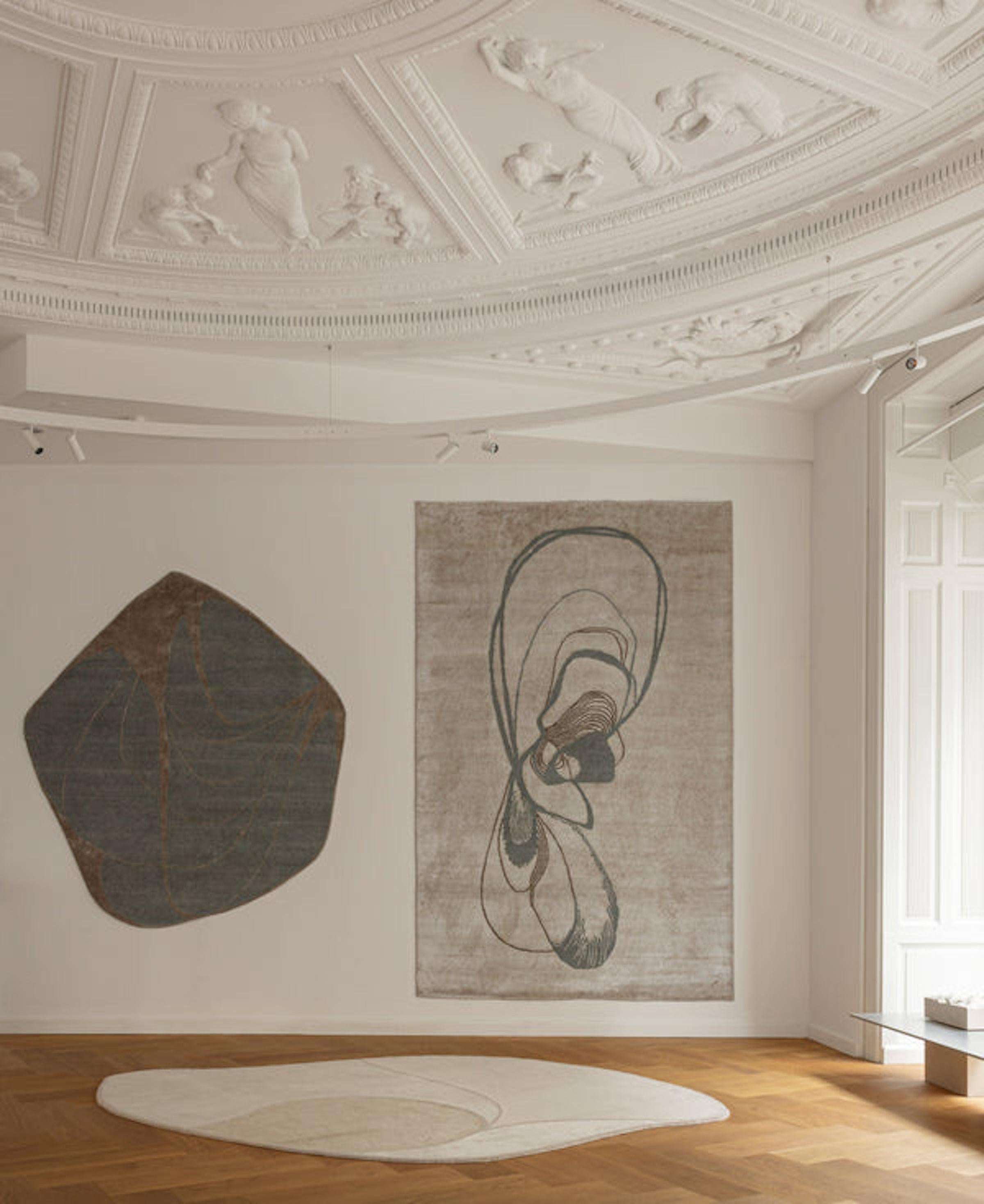 Oyster Tale, 'Watertopia' collection by Linie Design
Designer; Urd Moll Gundermann

Abstract rug. 
Materials: 80% Hand carded Wool / 20% Linen
Hand knotted rug

Model shown on main image:
'Oyster Tale'

Dimensions: 190 x 205 cm

Head of Design, Urd