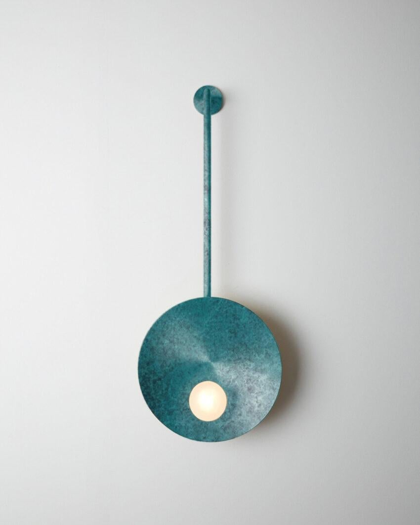 Oyster Verdigris Wall Mounted Lamp With Rod by Carla Baz
Dimensions: D 9 x W 30 x H 78 cm.
Materials: Verdigris metal.
Weight: 2 kg.

Available in verdigris, brushed brass, stainless steel, copper or bronze finishes. Available in different color
