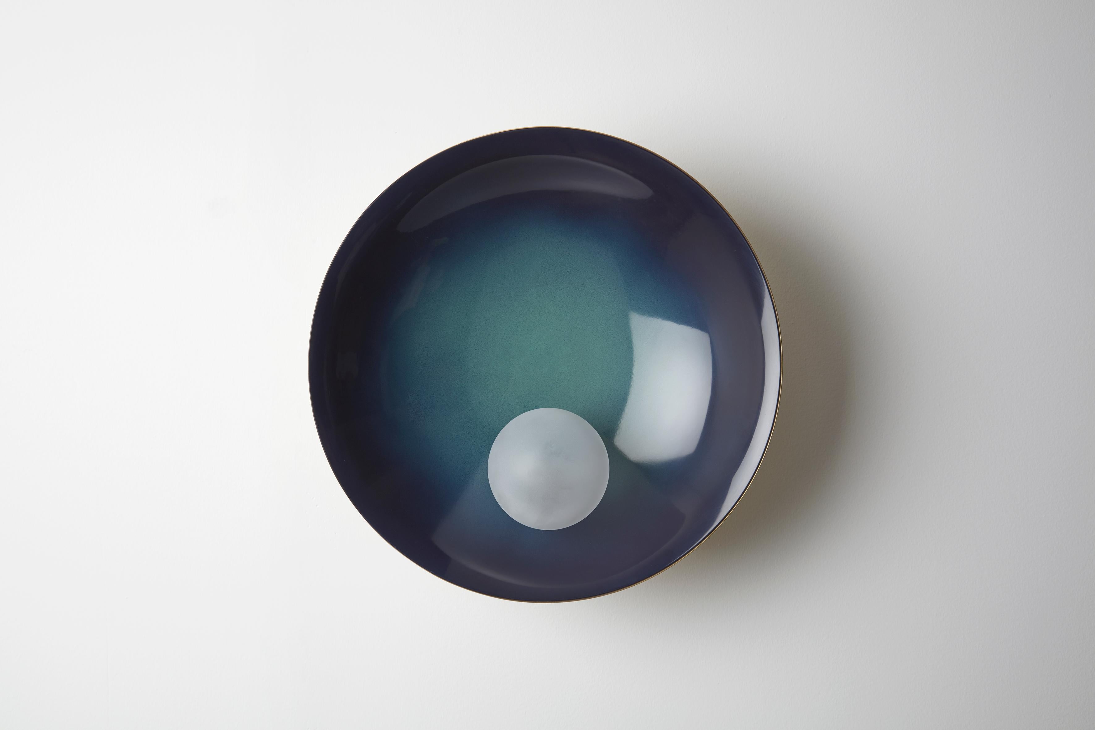 Oyster wall-ceiling mounted midnight blue, - Carla Baz
Dimensions: ø 40 x D 18 
Weight: 3.5 kg
Material: Brass, blown satin glass globes

Oyster is a series of sculptural lighting pieces that were developed in 2016. Wanting to explore the IDEA