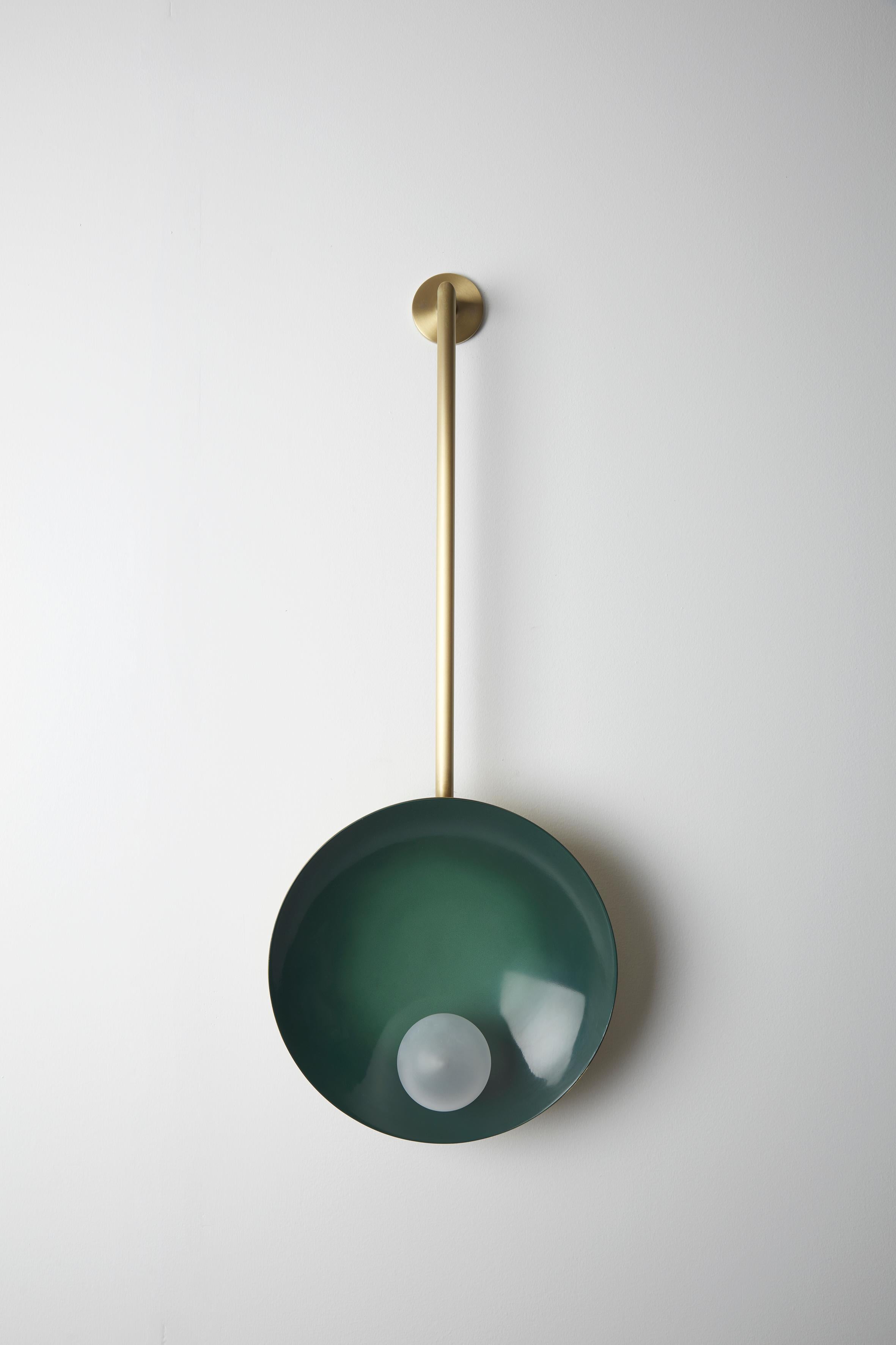 Oyster wall-mounted emerald green, Carla Baz
Dimensions: ø 30 x H 78 x D 14 cm
Weight: 2 kg
Material: Brass, blown satin glass globes

Oyster is a series of sculptural lighting pieces that were developed in 2016. Wanting to explore the idea of