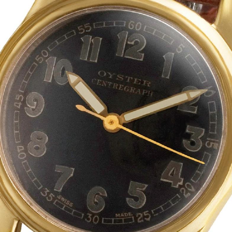 Oyster unisex en baño de oro con correa de piel. Manual. Ref 170188. Reloj Fine Pre-owned N/A.

Reloj Oyster Vintage de segunda mano certificado con correa de piel y hebilla de espiga chapada en oro. Caja de 28,5 mm con fondo redondo y esfera negra