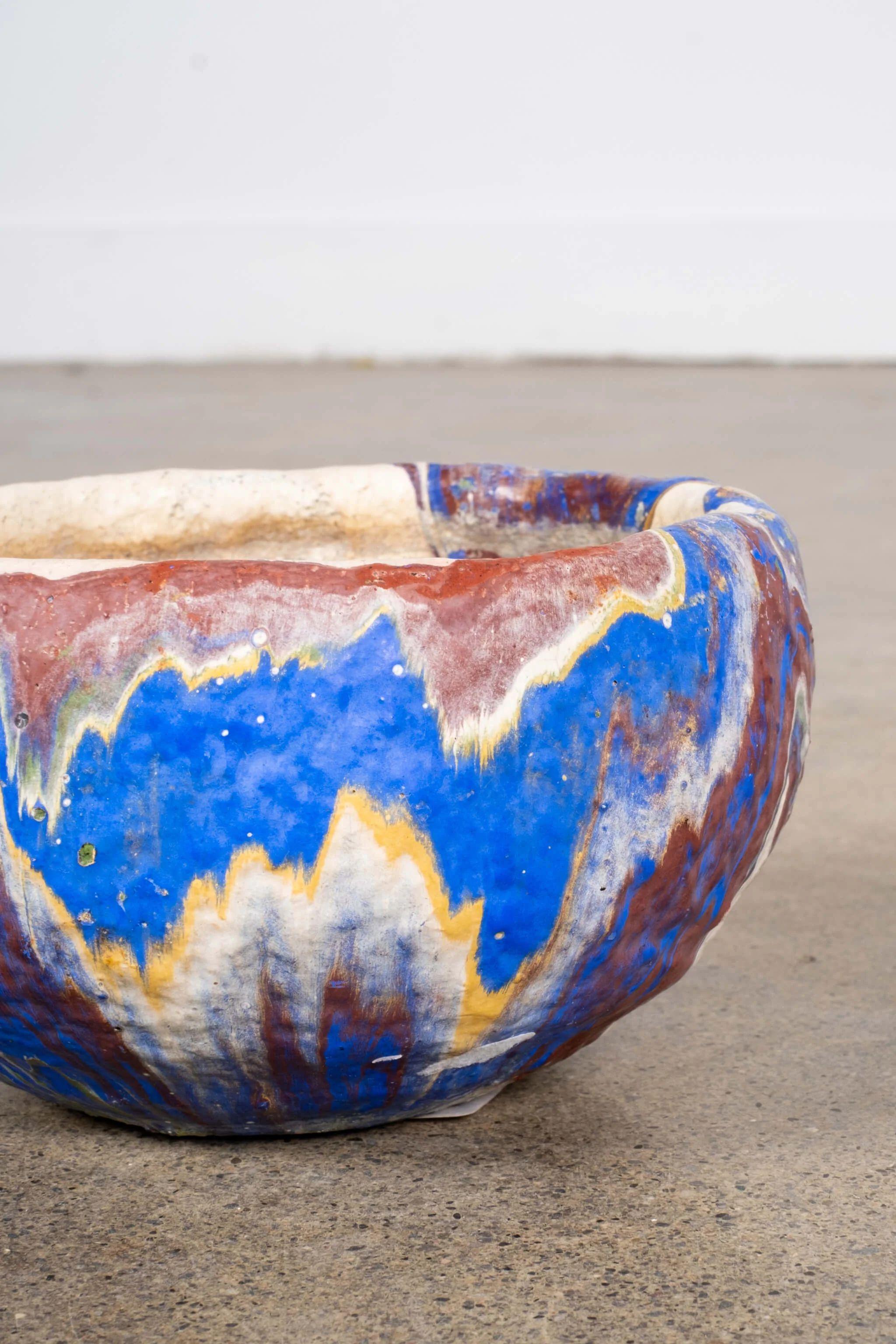 Small Blue Bowl

ABOUT OZARK ROADSIDE POTTERY
“Ozark pottery” refers to several mid-century American pottery makers that artificially coloured clay then turned pieces with marbleized swirls on the potter's wheel. Some makers include Ozark, Niloak,