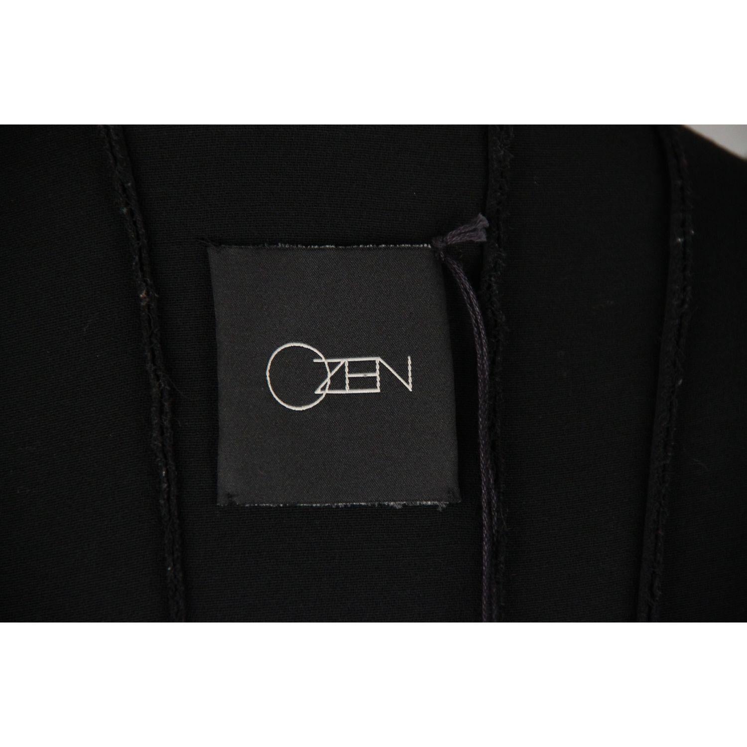 - Beautiful cardigan by OZEN, made in Italy - Composition: 100% Wool - Open front design - Size: 412IT - Internal Ref: - 49672513-MB - Shipping with DHL Express (Worlwide delivery: 3 to 5 days) - OZEN Black Wool OPEN FRONT CARDIGAN Size 42 - by: -