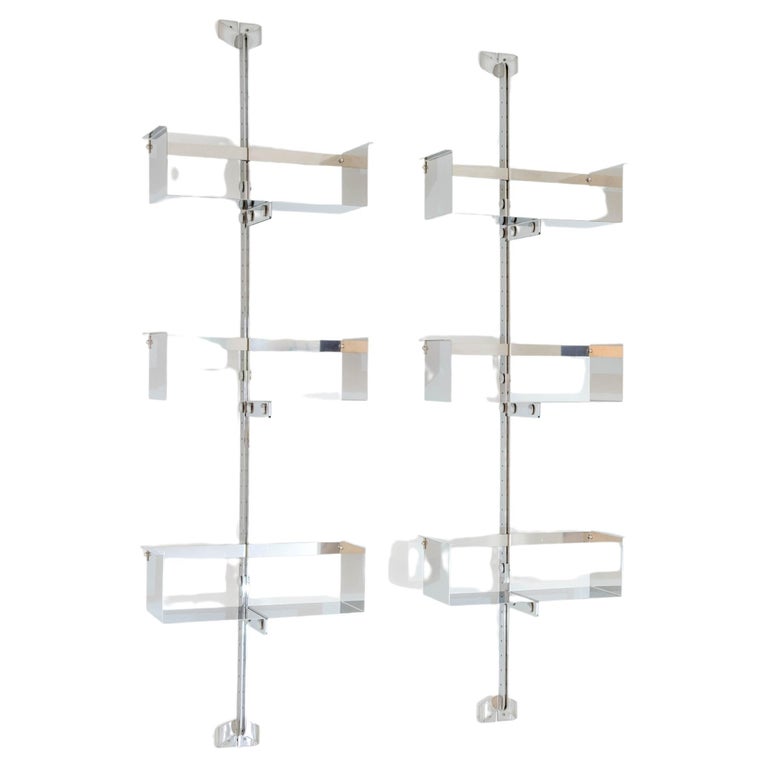 A pair of modular wall-mounted shelving systems P 700 ‚proposals‘, designed by Vittorio Introini, produced by Saporiti, Italy, circa 1970.

Stainless steel, very good condition. 

2 „poles“, 3 shelves per pole, shelves can be rearranged