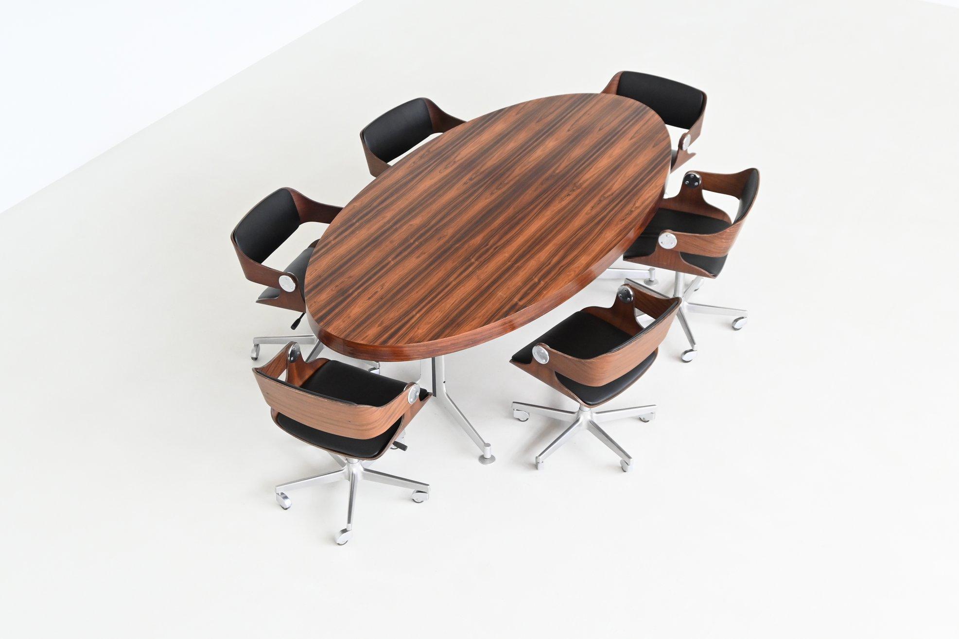 Rare and sculptural dining table designed by Preben Fabricius and Jørgen Kastholm for Kill Internationa, Germany 1970. This table is a superb example of refined modernist design. The oval tabletop is crafted from richly grained rosewood, showcasing