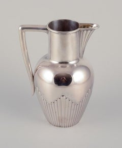 P. Hertz, Danish silversmith. Large Art Nouveau pitcher in 830 silver.