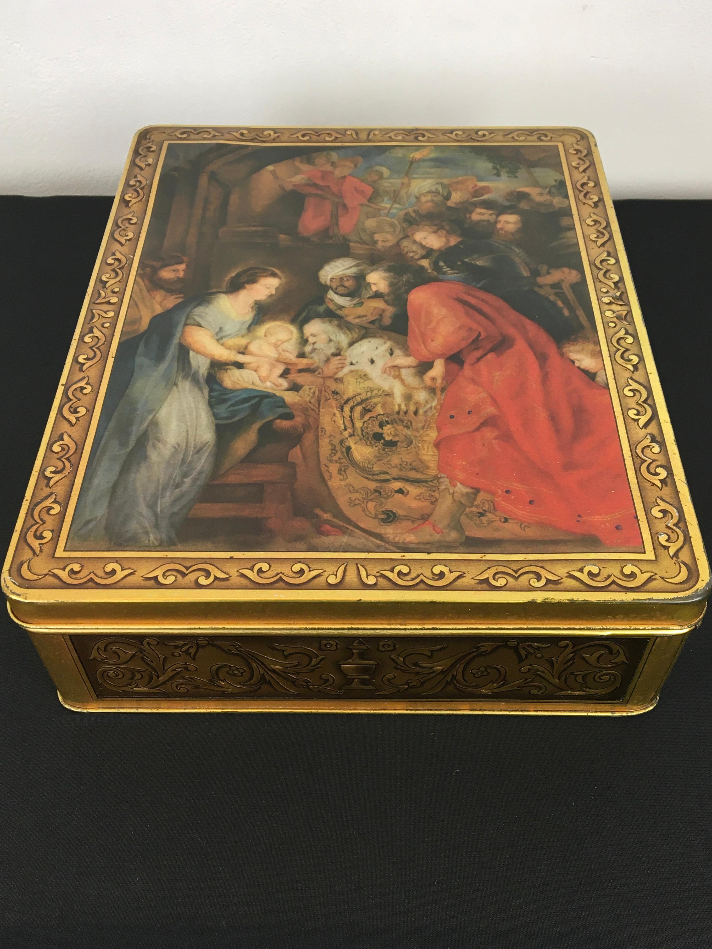 P.P Rubens - Peter Paul Rubens - Adoration of the Magi 
A Tin box for De Beukelaer Antwerp - Antwerp Biscuit Factory. 
This rectangular tin looks like a framed Rubens painting. 
Rubens was known as a Flemish barok painter who lived in Antwerp. 

The